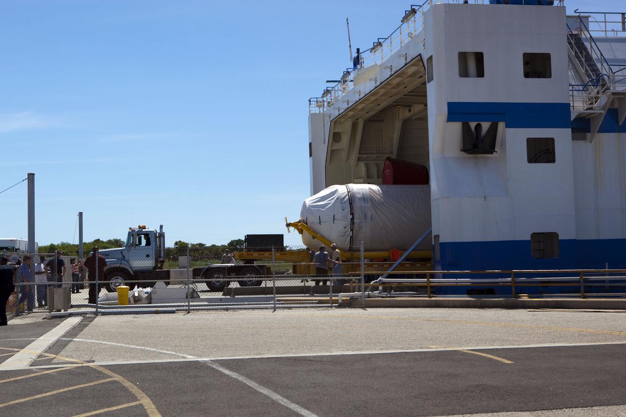 CAPE CANAVERAL, Fla. -- The Centaur upper stage to support the Mars Science Laboratory (MSL) mission is offloaded from the Delta Mariner transport ship at Port Canaveral in Florida.    MSL's components include a compact car-sized rover, Curiosity, which has 10 science instruments designed to search for evidence on whether Mars has had environments favorable to microbial life, including chemical ingredients for life.  The unique rover will use a laser to look inside rocks and release its gasses so that the rover’s spectrometer can analyze and send the data back to Earth. Launch of MSL aboard a United Launch Alliance Atlas V rocket is scheduled for Nov. 25 from Space Launch Complex 41 on Cape Canaveral Air Force Station. For more information, visit http://www.nasa.gov/msl. Photo credit: NASA/Dimitri Gerondidakis