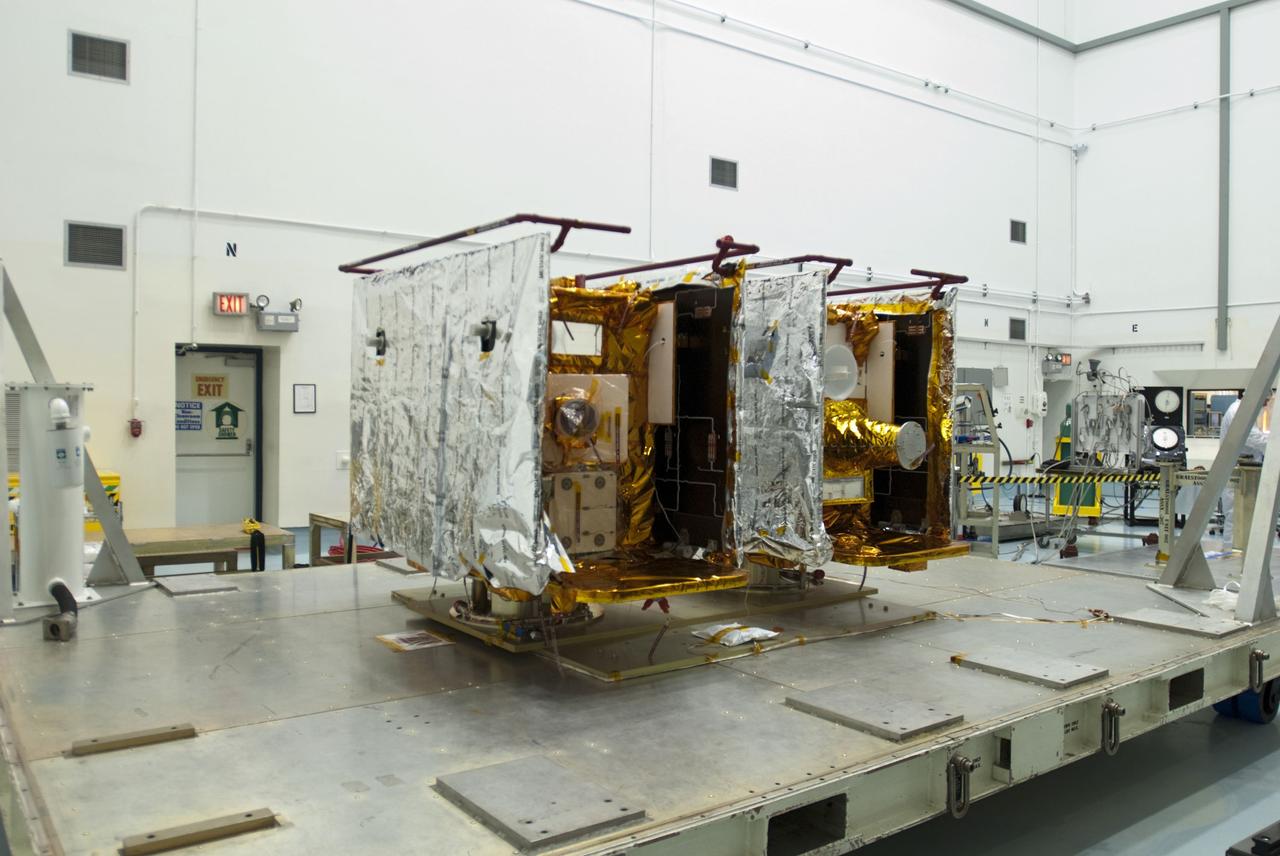 CAPE CANAVERAL, Fla. -- The mylar covering is removed from NASA's twin Gravity Recovery and Interior Laboratory lunar spacecraft in the Hazardous Processing Facility (HPF) at Astrotech Space Operation's payload processing facility in Titusville, Fla. In the HPF, the spacecraft will undergo two days of fueling activities. GRAIL will fly in tandem orbits around the moon for several months to measure its gravity field. GRAIL's primary science objectives are to determine the structure of the lunar interior, from crust to core, and to advance understanding of the thermal evolution of the moon. Launch aboard a United Launch Alliance Delta II rocket from Space Launch Complex 17B on Cape Canaveral Air Force Station is scheduled for Sept. 8. For more information, visit http://www.nasa.gov/grail. Photo credit: NASA/Charisse Nahser