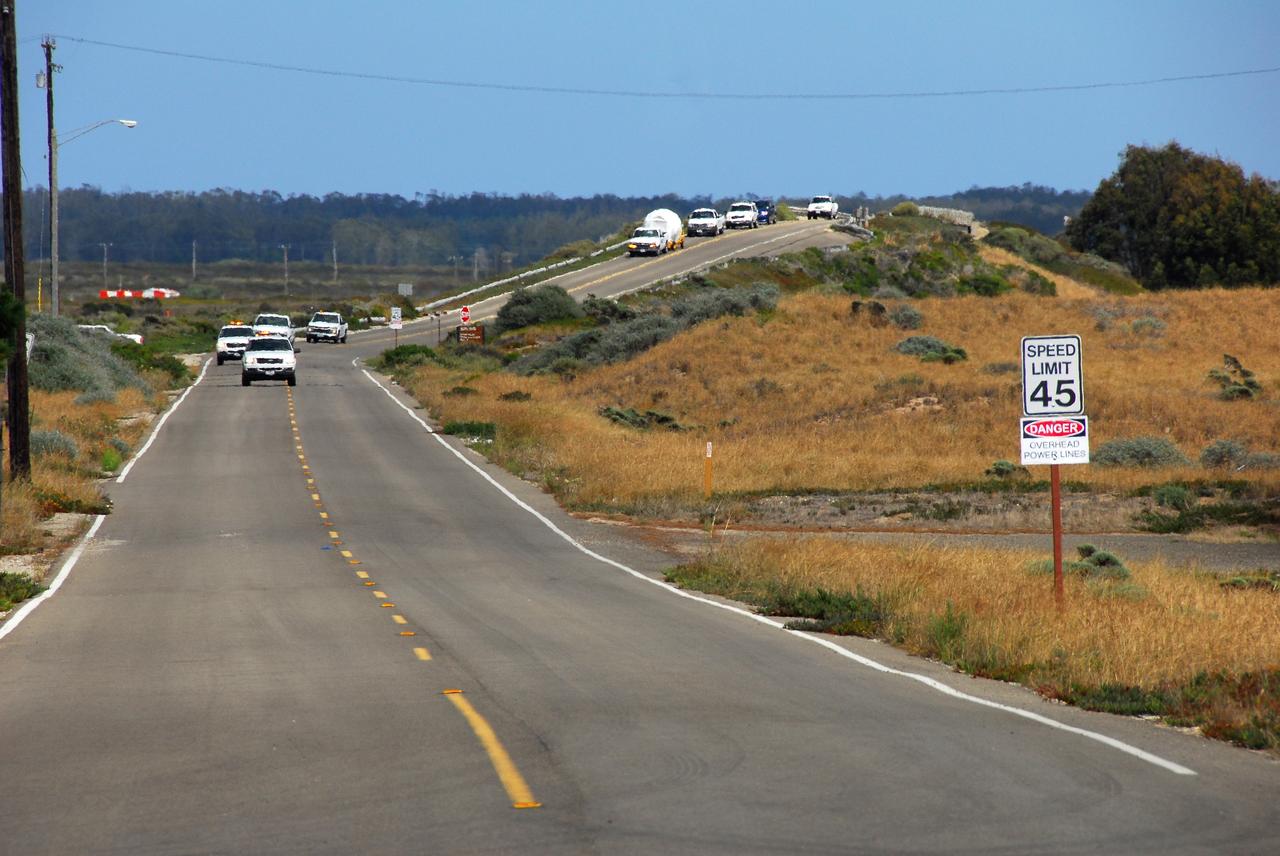 VANDENBERG AIR FORCE BASE, Calif. -- The second stage of a United Launch Alliance Delta II that will carry NASA's National Polar-orbiting Operational Environmental Satellite System Preparatory Project (NPP) satellite into space is on its way from NASA Hangar 836 to Space Launch Complex-2 at Vandenberg Air Force Base in California.    NPP will be positioned 512 miles above the Earth's surface and will orbit about 16 times each day to observe nearly the entire globe. The NPP mission for NASA and the National Oceanic and Atmospheric Administration (NOAA) is to measure Earth's atmospheric and sea surface temperatures, humidity sounding, land and ocean biological activity, and cloud and aerosol properties. For more information, visit www.nasa.gov/NPP. Photo credit: NASA/VAFB