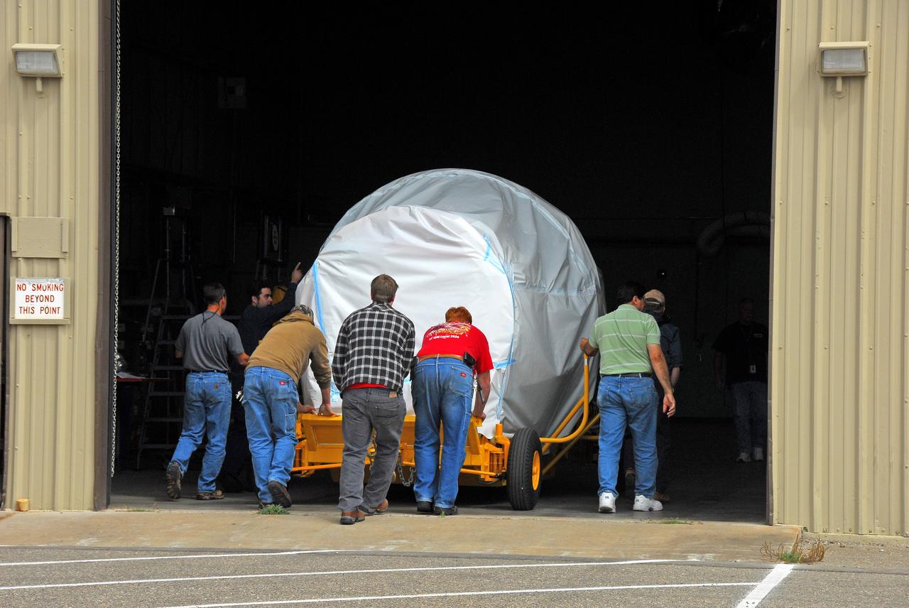 VANDENBERG AIR FORCE BASE, Calif. -- The second stage of a United Launch Alliance Delta II that will carry NASA's National Polar-orbiting Operational Environmental Satellite System Preparatory Project (NPP) satellite into space arrives at the United Launch Alliance Delta Mission Checkout Facility at Space Launch Complex-2 on Vandenberg Air Force Base in California.     NPP will be positioned 512 miles above the Earth's surface and will orbit about 16 times each day to observe nearly the entire globe. The NPP mission for NASA and the National Oceanic and Atmospheric Administration (NOAA) is to measure Earth's atmospheric and sea surface temperatures, humidity sounding, land and ocean biological activity, and cloud and aerosol properties. For more information, visit www.nasa.gov/NPP. Photo credit: NASA/VAFB