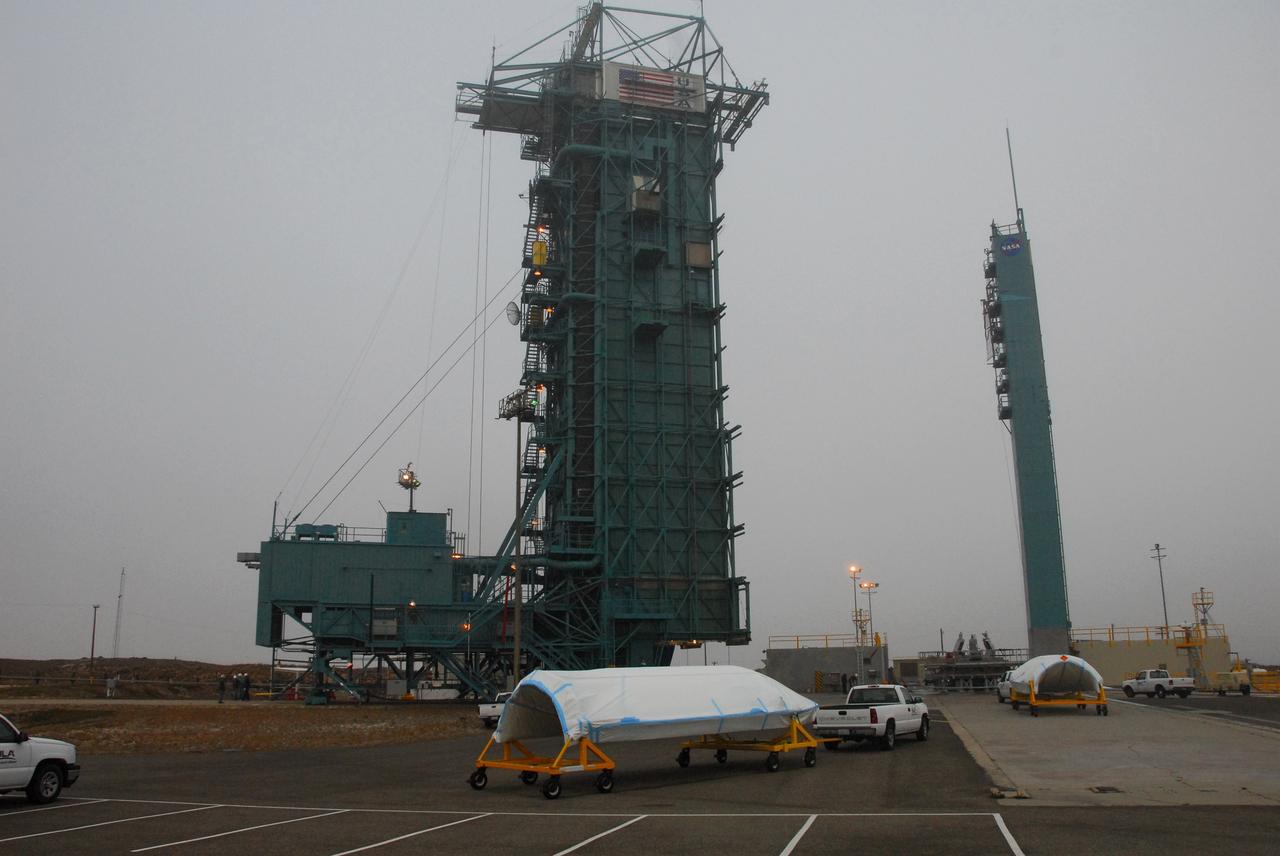 VANDENBERG AIR FORCE BASE, Calif. -- The payload fairing that will protect NASA's National Polar-orbiting Operational Environmental Satellite System Preparatory Project (NPP) satellite as it launches aboard a United Launch Alliance Delta II is ready to be lifted to Level 5 of Space Launch Complex-2 at Vandenberg Air Force Base in California.     NPP will be positioned 512 miles above the Earth's surface and will orbit about 16 times each day to observe nearly the entire globe. The NPP mission for NASA and the National Oceanic and Atmospheric Administration (NOAA) is to measure Earth's atmospheric and sea surface temperatures, humidity sounding, land and ocean biological activity, and cloud and aerosol properties. For more information, visit www.nasa.gov/NPP. Photo credit: NASA/VAFB, Roy Allison