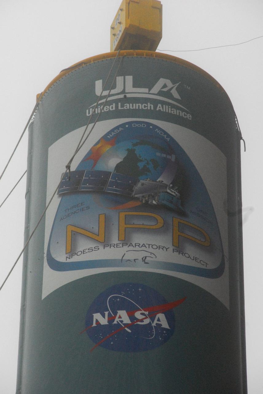 VANDENBERG AIR FORCE BASE, Calif. -- The tip-top of a United Launch Alliance Delta II first stage is visible as it is lifted at NASA's Space Launch Complex-2 on Vandenberg Air Force Base in California. The rocket will carry NASA's National Polar-orbiting Operational Environmental Satellite System Preparatory Project (NPP) satellite into space.    NPP will be positioned 512 miles above the Earth's surface and will orbit about 16 times each day to observe nearly the entire globe. The NPP mission for NASA and the National Oceanic and Atmospheric Administration (NOAA) is to measure Earth's atmospheric and sea surface temperatures, humidity sounding, land and ocean biological activity, and cloud and aerosol properties. For more information, visit www.nasa.gov/NPP. Photo credit: NASA/VAFB, Mark Mackley