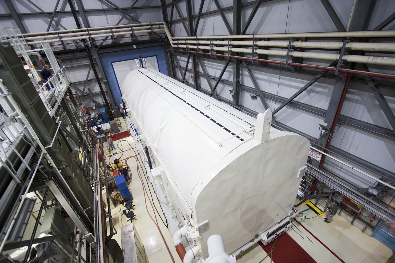 CAPE CANAVERAL, Fla. -- In Orbiter Processing Facility-2 (OPF-2) at NASA’s Kennedy Space Center in Florida, the payload canister doors are completely closed around the Raffaello multi-purpose logistics module after a special payload removal device was used to remove it from Atlantis’ cargo bay. Raffaello will then be readied for transport to the Space Station Processing Facility where its contents will be unloaded. Atlantis completed NASA’s final space shuttle mission, STS-135, after landing at the center’s Shuttle Landing Facility, July 21, 2011, at 5:57 a.m. EDT. Following removal of all payloads in Atlantis’ cargo bay, workers will begin to prepare the spacecraft for eventual permanent display at the Kennedy Space Center Visitor Complex. Photo credit: Jim Grossman