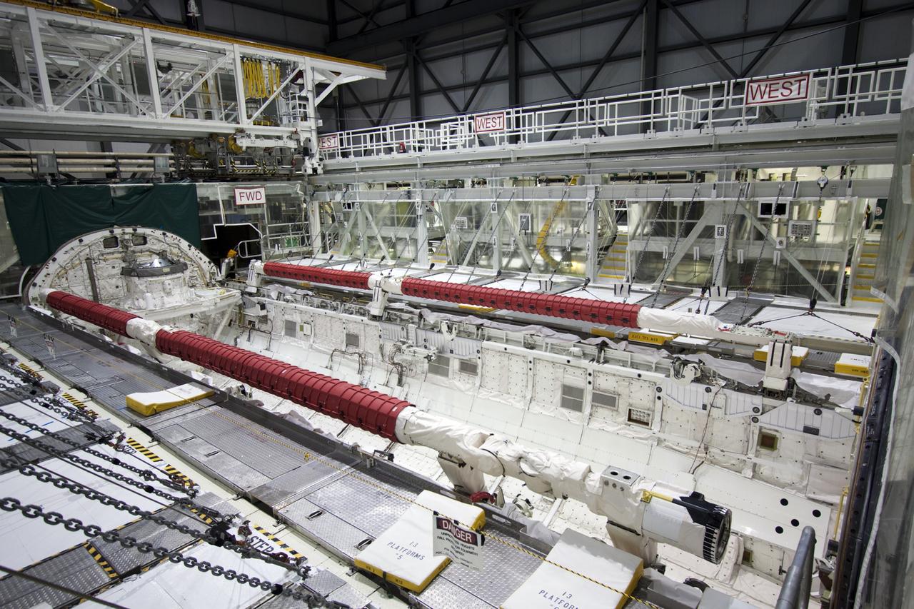 CAPE CANAVERAL, Fla. -- In Orbiter Processing Facility-2 (OPF-2) at NASA’s Kennedy Space Center in Florida, Atlantis’ cargo bay is empty after a special payload removal device was used to remove the Raffaello multi-purpose logistics module and transfer it to a payload canister. Raffaello will then be readied for transport to the Space Station Processing Facility where its contents will be unloaded. Atlantis completed NASA’s final space shuttle mission, STS-135, after landing at the center’s Shuttle Landing Facility, July 21, 2011, at 5:57 a.m. EDT. Following removal of all payloads in Atlantis’ cargo bay, workers will begin to prepare the spacecraft for eventual permanent display at the Kennedy Space Center Visitor Complex. Photo credit: Jim Grossman