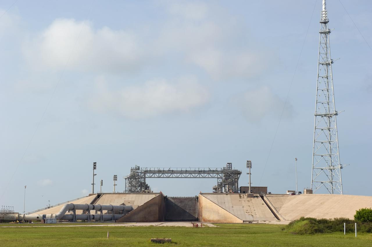 CAPE CANAVERAL, Fla. -- At NASA's Kennedy Space Center in Florida, the flame trench remains at Launch Pad 39B after the pad's deconstruction. The trench is 450 feet long, 58 feet wide and 42 feet deep with an inner inverted V-shaped steel flame deflector. In 2009, the structure at the pad was no longer needed for NASA's Space Shuttle Program, so it is being restructured for future use. The new design will feature a "clean pad" for rockets to come with their own launcher, making it more versatile for a number of vehicles. For information on NASA's future plans, visit http://www.nasa.gov/exploration. Photo credit: NASA/Kim Shiflett