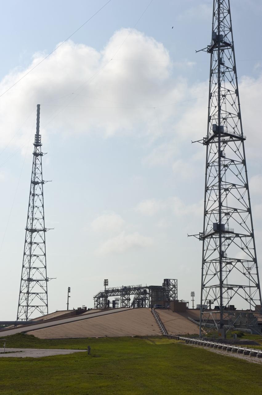 CAPE CANAVERAL, Fla. -- At NASA's Kennedy Space Center in Florida, only remnants of the support structures remain on Launch Pad 39B after the pad's deconstruction. In 2009, the structure at the pad was no longer needed for NASA's Space Shuttle Program, so it is being restructured for future use. The new design will feature a "clean pad" for rockets to come with their own launcher, making it more versatile for a number of vehicles. For information on NASA's future plans, visit http://www.nasa.gov/exploration. Photo credit: NASA/Kim Shiflett