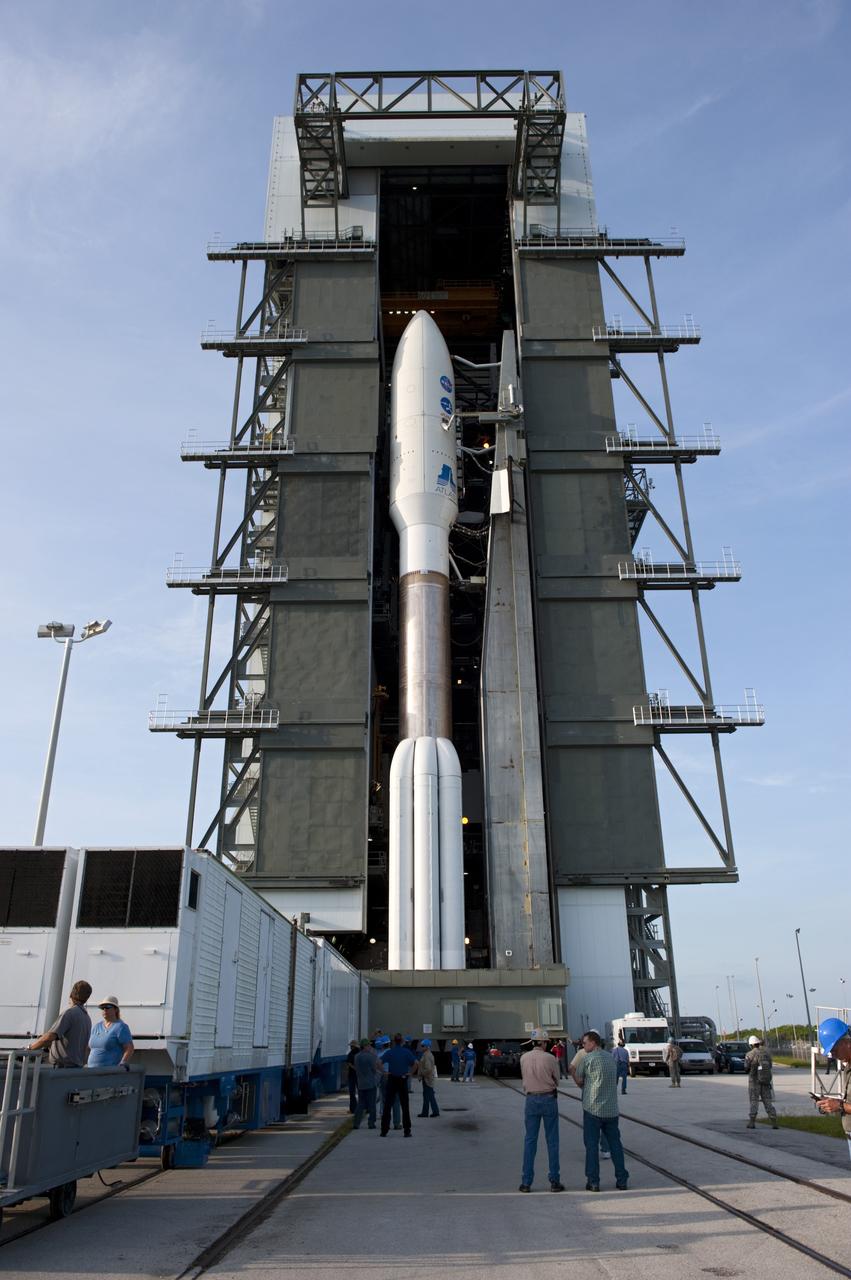 CAPE CANAVERAL, Fla. -- On Cape Canaveral Air Force Station in Florida, the 197-foot-tall United Launch Alliance Atlas V-551 launch vehicle begins to roll out of the Vertical Integration Facility for its move to Space Launch Complex 41. Atop the rocket is NASA's Juno spacecraft, enclosed in its payload fairing. Liftoff is planned during a launch window which extends from 11:34 a.m. to 12:43 p.m. EDT on Aug. 5. The solar-powered spacecraft will orbit Jupiter's poles 33 times to find out more about the gas giant's origins, structure, atmosphere and magnetosphere and investigate the existence of a solid planetary core. NASA's Jet Propulsion Laboratory, Pasadena, Calif., manages the Juno mission for the principal investigator, Scott Bolton, of Southwest Research Institute in San Antonio. The Juno mission is part of the New Frontiers Program managed at NASA's Marshall Space Flight Center in Huntsville, Ala. Lockheed Martin Space Systems, Denver, built the spacecraft. Launch management for the mission is the responsibility of NASA's Launch Services Program at the Kennedy Space Center in Florida. For more information, visit www.nasa.gov/juno. Photo credit: NASA/Kim Shiflett