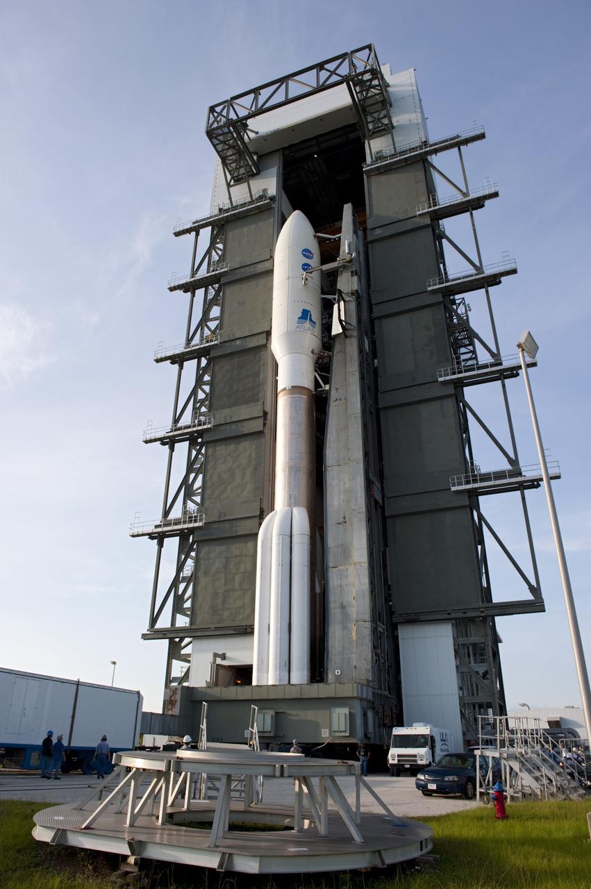 CAPE CANAVERAL, Fla. -- On Cape Canaveral Air Force Station in Florida, the 197-foot-tall United Launch Alliance Atlas V-551 launch vehicle rolls out of the Vertical Integration Facility for its move to Space Launch Complex 41.  Atop the rocket is NASA's Juno spacecraft, enclosed in its payload fairing.    Liftoff is planned during a launch window which extends from 11:34 a.m. to 12:43 p.m. EDT on Aug. 5. The solar-powered spacecraft will orbit Jupiter's poles 33 times to find out more about the gas giant's origins, structure, atmosphere and magnetosphere and investigate the existence of a solid planetary core. NASA's Jet Propulsion Laboratory, Pasadena, Calif., manages the Juno mission for the principal investigator, Scott Bolton, of Southwest Research Institute in San Antonio. The Juno mission is part of the New Frontiers Program managed at NASA's Marshall Space Flight Center in Huntsville, Ala. Lockheed Martin Space Systems, Denver, built the spacecraft. Launch management for the mission is the responsibility of NASA's Launch Services Program at the Kennedy Space Center in Florida.  For more information, visit www.nasa.gov/juno. Photo credit: NASA/Kim Shiflett