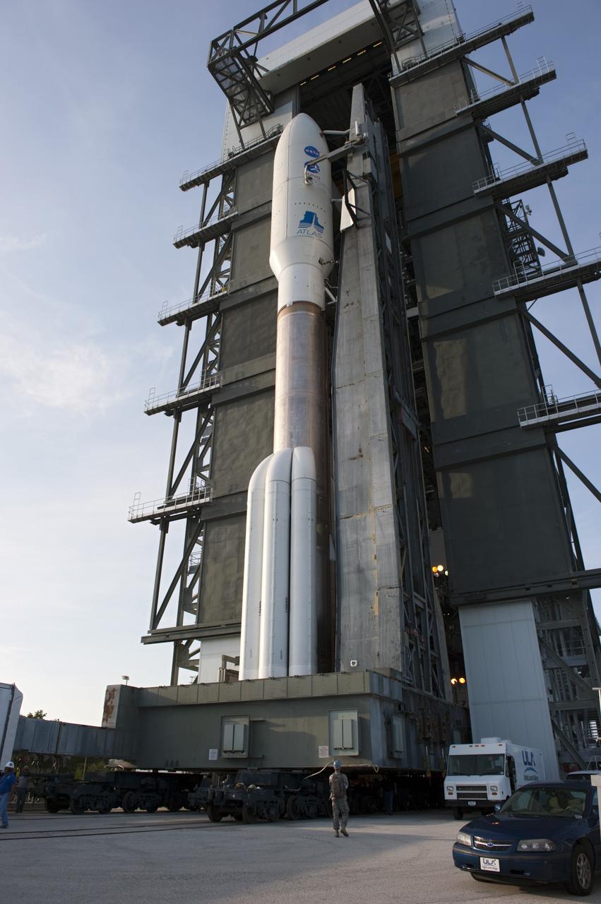 CAPE CANAVERAL, Fla. -- On Cape Canaveral Air Force Station in Florida, the 197-foot-tall United Launch Alliance Atlas V-551 launch vehicle rolls out of the Vertical Integration Facility for its move to Space Launch Complex 41.  Atop the rocket is NASA's Juno spacecraft, enclosed in its payload fairing.    Liftoff is planned during a launch window which extends from 11:34 a.m. to 12:43 p.m. EDT on Aug. 5. The solar-powered spacecraft will orbit Jupiter's poles 33 times to find out more about the gas giant's origins, structure, atmosphere and magnetosphere and investigate the existence of a solid planetary core. NASA's Jet Propulsion Laboratory, Pasadena, Calif., manages the Juno mission for the principal investigator, Scott Bolton, of Southwest Research Institute in San Antonio. The Juno mission is part of the New Frontiers Program managed at NASA's Marshall Space Flight Center in Huntsville, Ala. Lockheed Martin Space Systems, Denver, built the spacecraft. Launch management for the mission is the responsibility of NASA's Launch Services Program at the Kennedy Space Center in Florida.  For more information, visit www.nasa.gov/juno. Photo credit: NASA/Kim Shiflett
