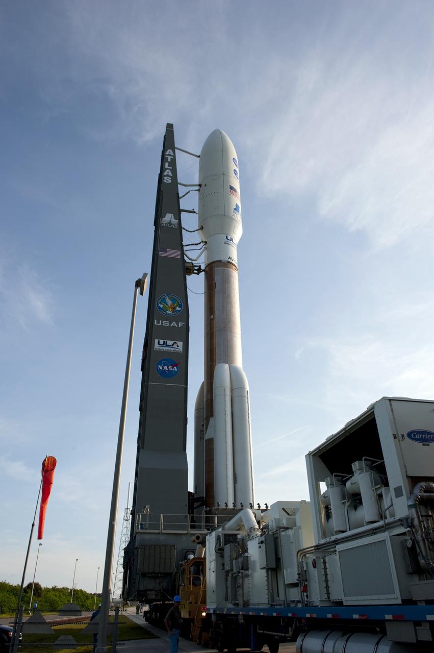 CAPE CANAVERAL, Fla. -- On Cape Canaveral Air Force Station in Florida, the 197-foot-tall United Launch Alliance Atlas V-551 launch vehicle makes a slow, steady approach to Space Launch Complex 41 on its move from the Vertical Integration Facility.  Atop the rocket is NASA's Juno spacecraft, enclosed in its payload fairing.    Liftoff is planned during a launch window which extends from 11:34 a.m. to 12:43 p.m. EDT on Aug. 5. The solar-powered spacecraft will orbit Jupiter's poles 33 times to find out more about the gas giant's origins, structure, atmosphere and magnetosphere and investigate the existence of a solid planetary core. NASA's Jet Propulsion Laboratory, Pasadena, Calif., manages the Juno mission for the principal investigator, Scott Bolton, of Southwest Research Institute in San Antonio. The Juno mission is part of the New Frontiers Program managed at NASA's Marshall Space Flight Center in Huntsville, Ala. Lockheed Martin Space Systems, Denver, built the spacecraft. Launch management for the mission is the responsibility of NASA's Launch Services Program at the Kennedy Space Center in Florida.  For more information, visit www.nasa.gov/juno. Photo credit: NASA/Kim Shiflett
