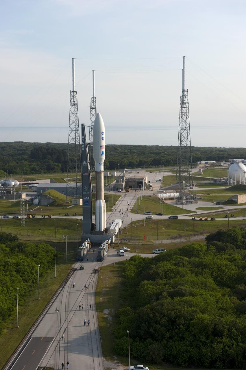 CAPE CANAVERAL, Fla. -- On Cape Canaveral Air Force Station in Florida, the United Launch Alliance Atlas V-551 launch vehicle nears its destination on Space Launch Complex 41.  Atop the rocket is NASA's Juno spacecraft, enclosed in its payload fairing.    Liftoff is planned during a launch window which extends from 11:34 a.m. to 12:43 p.m. EDT on Aug. 5. The solar-powered spacecraft will orbit Jupiter's poles 33 times to find out more about the gas giant's origins, structure, atmosphere and magnetosphere and investigate the existence of a solid planetary core. NASA's Jet Propulsion Laboratory, Pasadena, Calif., manages the Juno mission for the principal investigator, Scott Bolton, of Southwest Research Institute in San Antonio. The Juno mission is part of the New Frontiers Program managed at NASA's Marshall Space Flight Center in Huntsville, Ala. Lockheed Martin Space Systems, Denver, built the spacecraft. Launch management for the mission is the responsibility of NASA's Launch Services Program at the Kennedy Space Center in Florida.  For more information, visit www.nasa.gov/juno. Photo credit: NASA/Kim Shiflett