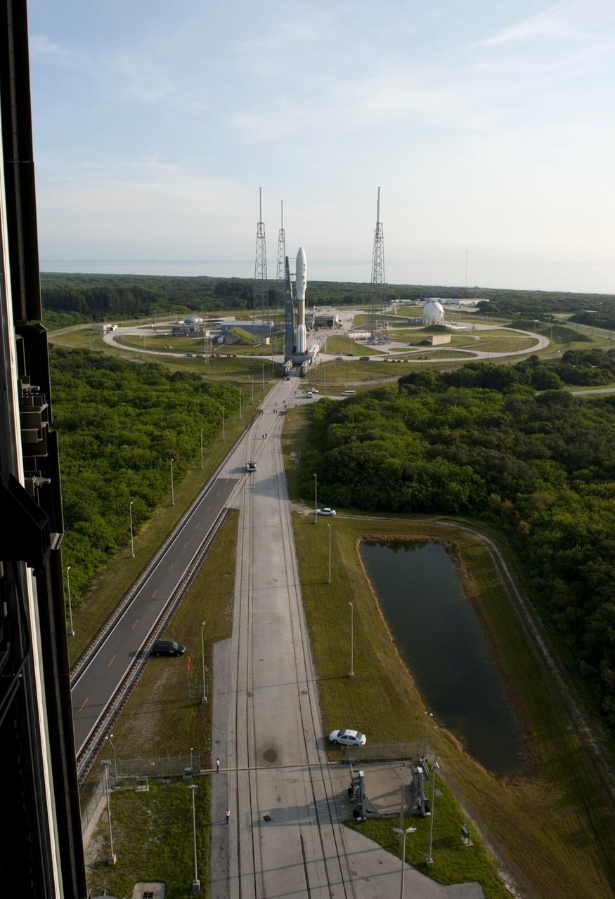 CAPE CANAVERAL, Fla. -- On Cape Canaveral Air Force Station in Florida, the Vertical Integration Facility offers a unique vantage point to view the United Launch Alliance Atlas V-551 launch vehicle as it nears the launch stand on Space Launch Complex 41.  Atop the rocket is NASA's Juno spacecraft, enclosed in its payload fairing.    Liftoff is planned during a launch window which extends from 11:34 a.m. to 12:43 p.m. EDT on Aug. 5. The solar-powered spacecraft will orbit Jupiter's poles 33 times to find out more about the gas giant's origins, structure, atmosphere and magnetosphere and investigate the existence of a solid planetary core. NASA's Jet Propulsion Laboratory, Pasadena, Calif., manages the Juno mission for the principal investigator, Scott Bolton, of Southwest Research Institute in San Antonio. The Juno mission is part of the New Frontiers Program managed at NASA's Marshall Space Flight Center in Huntsville, Ala. Lockheed Martin Space Systems, Denver, built the spacecraft. Launch management for the mission is the responsibility of NASA's Launch Services Program at the Kennedy Space Center in Florida.  For more information, visit www.nasa.gov/juno. Photo credit: NASA/Kim Shiflett