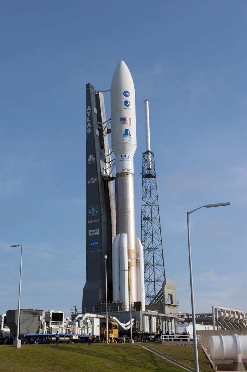 CAPE CANAVERAL, Fla. -- On Cape Canaveral Air Force Station in Florida, the 197-foot-tall United Launch Alliance Atlas V-551 launch vehicle is in position on the launch pad at Space Launch Complex 41.  Atop the rocket is NASA's Juno spacecraft, enclosed in its payload fairing.    Liftoff is planned during a launch window which extends from 11:34 a.m. to 12:43 p.m. EDT on Aug. 5. The solar-powered spacecraft will orbit Jupiter's poles 33 times to find out more about the gas giant's origins, structure, atmosphere and magnetosphere and investigate the existence of a solid planetary core. NASA's Jet Propulsion Laboratory, Pasadena, Calif., manages the Juno mission for the principal investigator, Scott Bolton, of Southwest Research Institute in San Antonio. The Juno mission is part of the New Frontiers Program managed at NASA's Marshall Space Flight Center in Huntsville, Ala. Lockheed Martin Space Systems, Denver, built the spacecraft. Launch management for the mission is the responsibility of NASA's Launch Services Program at the Kennedy Space Center in Florida.  For more information, visit www.nasa.gov/juno. Photo credit: NASA/Kim Shiflett