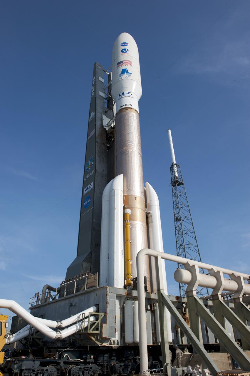 CAPE CANAVERAL, Fla. -- On Cape Canaveral Air Force Station in Florida, the 197-foot-tall United Launch Alliance Atlas V-551 launch vehicle towers over its launch platform at Space Launch Complex 41.  Atop the rocket is NASA's Juno spacecraft, enclosed in its payload fairing.    Liftoff is planned during a launch window which extends from 11:34 a.m. to 12:43 p.m. EDT on Aug. 5. The solar-powered spacecraft will orbit Jupiter's poles 33 times to find out more about the gas giant's origins, structure, atmosphere and magnetosphere and investigate the existence of a solid planetary core. NASA's Jet Propulsion Laboratory, Pasadena, Calif., manages the Juno mission for the principal investigator, Scott Bolton, of Southwest Research Institute in San Antonio. The Juno mission is part of the New Frontiers Program managed at NASA's Marshall Space Flight Center in Huntsville, Ala. Lockheed Martin Space Systems, Denver, built the spacecraft. Launch management for the mission is the responsibility of NASA's Launch Services Program at the Kennedy Space Center in Florida.  For more information, visit www.nasa.gov/juno. Photo credit: NASA/Kim Shiflett