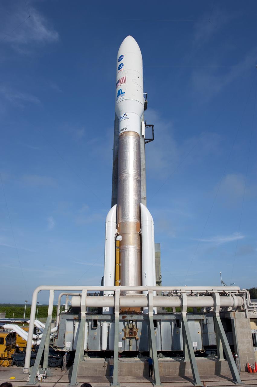 CAPE CANAVERAL, Fla. -- On Cape Canaveral Air Force Station in Florida, the 197-foot-tall United Launch Alliance Atlas V-551 launch vehicle towers over its launch platform at Space Launch Complex 41.  Atop the rocket is NASA's Juno spacecraft, enclosed in its payload fairing.    Liftoff is planned during a launch window which extends from 11:34 a.m. to 12:43 p.m. EDT on Aug. 5. The solar-powered spacecraft will orbit Jupiter's poles 33 times to find out more about the gas giant's origins, structure, atmosphere and magnetosphere and investigate the existence of a solid planetary core. NASA's Jet Propulsion Laboratory, Pasadena, Calif., manages the Juno mission for the principal investigator, Scott Bolton, of Southwest Research Institute in San Antonio. The Juno mission is part of the New Frontiers Program managed at NASA's Marshall Space Flight Center in Huntsville, Ala. Lockheed Martin Space Systems, Denver, built the spacecraft. Launch management for the mission is the responsibility of NASA's Launch Services Program at the Kennedy Space Center in Florida.  For more information, visit www.nasa.gov/juno. Photo credit: NASA/Kim Shiflett