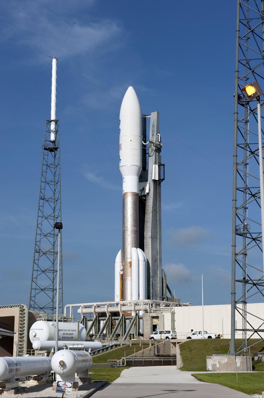 CAPE CANAVERAL, Fla. -- NASA's Juno spacecraft, enclosed in its payload fairing atop a United Launch Alliance Atlas V-551 launch vehicle, towers over Space Launch Complex 41 on Cape Canaveral Air Force Station in Florida.    Launch is planned during a launch window which extends from 11:34 a.m. to 12:43 p.m. EDT on Aug. 5. The solar-powered spacecraft will orbit Jupiter's poles 33 times to find out more about the gas giant's origins, structure, atmosphere and magnetosphere and investigate the existence of a solid planetary core. NASA's Jet Propulsion Laboratory, Pasadena, Calif., manages the Juno mission for the principal investigator, Scott Bolton, of Southwest Research Institute in San Antonio. The Juno mission is part of the New Frontiers Program managed at NASA's Marshall Space Flight Center in Huntsville, Ala. Lockheed Martin Space Systems, Denver, built the spacecraft. Launch management for the mission is the responsibility of NASA's Launch Services Program at the Kennedy Space Center in Florida.  For more information, visit www.nasa.gov/juno. Photo credit: NASA/Kim Shiflett