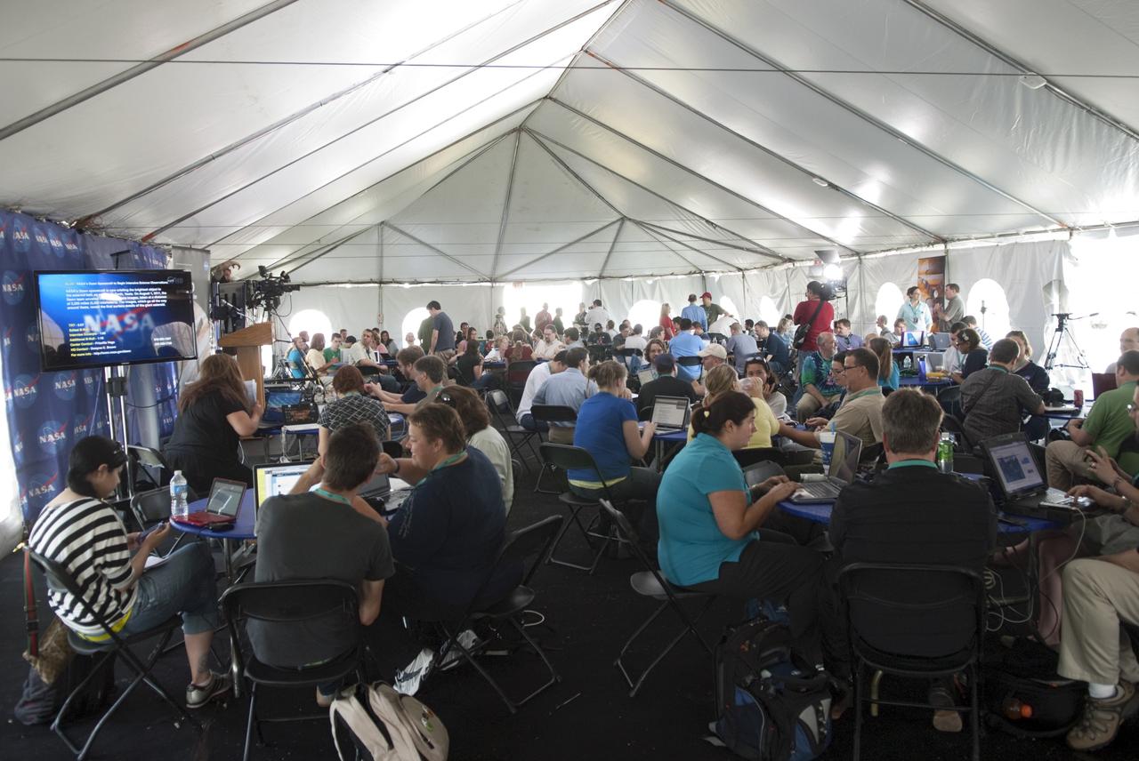 CAPE CANAVERAL, Fla. – At NASA’s Kennedy Space Center in Florida, about 150 followers of the agency’s Twitter account arrived at the Tweetup tent at the Press Site for two days of Juno prelaunch activities. Juno is NASA’s mission to Jupiter to study the giant planet and improve our understanding of the planet’s formation and evolution. The tweeters will share their experiences with followers through the social networking site Twitter.     Attendees represent 28 states, the District of Columbia and five other countries: Canada, Finland, Norway, Spain and the United Kingdom. This is the first time NASA has invited Twitter followers to experience the launch of a planetary spacecraft.  The Juno spacecraft is scheduled to launch on an Atlas V rocket from Space Launch Complex 41 at Cape Canaveral Air Force Station in Florida, Aug. 5, at 11:34 a.m. EDT.  For more information, visit http://www.nasa.gov/juno.  Photo credit: Jim Grossmann