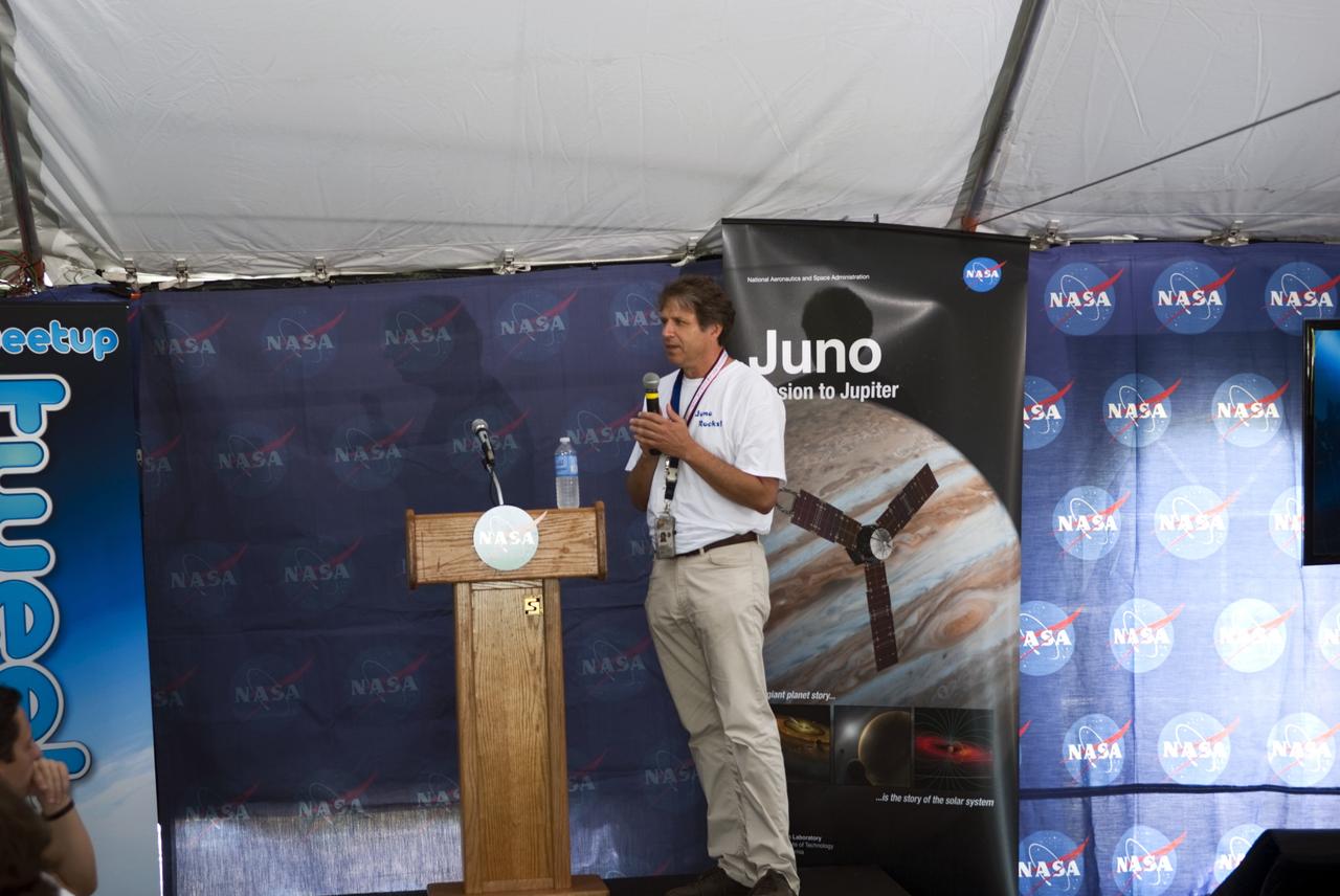 CAPE CANAVERAL, Fla. – At NASA’s Kennedy Space Center in Florida, Scott Bolton, Juno primary investigator from the Southwest Research Institute in San Antonio, speaks to about 150 followers of the agency’s Twitter account during Juno Tweetup activities inside a tent at the Press Site. The tweeters are at the center for two days of prelaunch activities. Juno is NASA’s mission to Jupiter to study the giant planet and improve our understanding of the planet’s formation and evolution. The tweeters will share their experiences with followers through the social networking site Twitter.      Attendees represent 28 states, the District of Columbia and five other countries: Canada, Finland, Norway, Spain and the United Kingdom. This is the first time NASA has invited Twitter followers to experience the launch of a planetary spacecraft.  The Juno spacecraft is scheduled to launch on an Atlas V rocket from Space Launch Complex 41 at Cape Canaveral Air Force Station in Florida, Aug. 5, at 11:34 a.m. EDT.  For more information, visit http://www.nasa.gov/juno.  Photo credit: Jim Grossmann