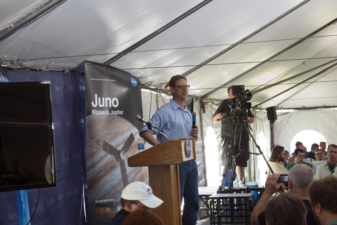 CAPE CANAVERAL, Fla. – At NASA’s Kennedy Space Center in Florida, Steve Levin, Juno project scientist from the Jet Propulsion Laboratory in Pasadena, Calif., speaks to about 150 followers of the agency’s Twitter account during Juno Tweetup activities inside a tent at the Press Site. The tweeters are at the center for two days of prelaunch activities. Juno is NASA’s mission to Jupiter to study the giant planet and improve our understanding of the planet’s formation and evolution. The tweeters will share their experiences with followers through the social networking site Twitter.      Attendees represent 28 states, the District of Columbia and five other countries: Canada, Finland, Norway, Spain and the United Kingdom. This is the first time NASA has invited Twitter followers to experience the launch of a planetary spacecraft.  The Juno spacecraft is scheduled to launch on an Atlas V rocket from Space Launch Complex 41 at Cape Canaveral Air Force Station in Florida, Aug. 5, at 11:34 a.m. EDT.  For more information, visit http://www.nasa.gov/juno.  Photo credit: Jim Grossmann