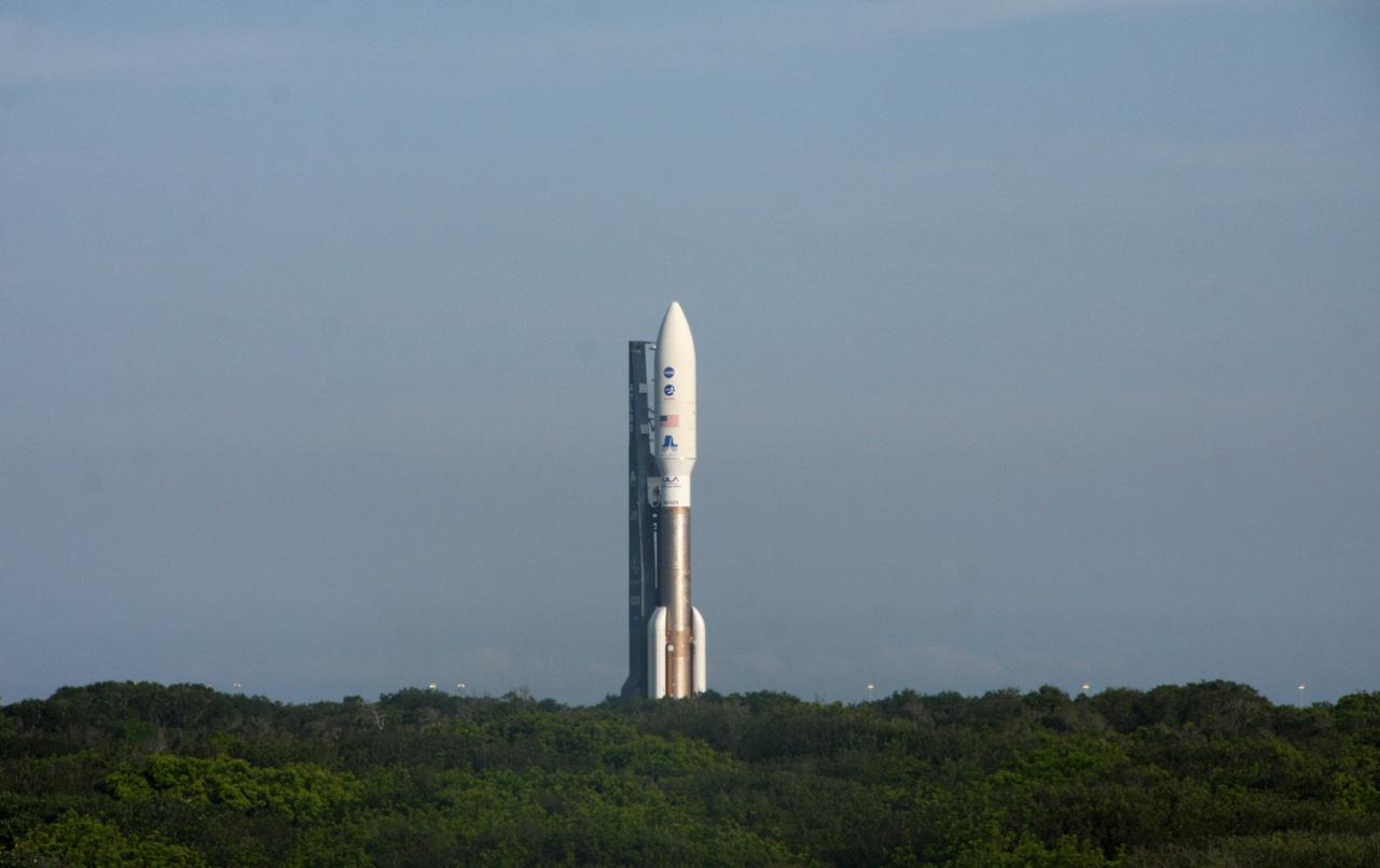 CAPE CANAVERAL, Fla. -- On Cape Canaveral Air Force Station in Florida, the 197-foot-tall United Launch Alliance Atlas V-551 launch vehicle moves at a slow, steady pace from the Vertical Integration Facility to the launch pad at Space Launch Complex 41.  Atop the rocket is NASA's Juno spacecraft, enclosed in its payload fairing.    Liftoff is planned during a launch window which extends from 11:34 a.m. to 12:43 p.m. EDT on Aug. 5. The solar-powered spacecraft will orbit Jupiter's poles 33 times to find out more about the gas giant's origins, structure, atmosphere and magnetosphere and investigate the existence of a solid planetary core. NASA's Jet Propulsion Laboratory, Pasadena, Calif., manages the Juno mission for the principal investigator, Scott Bolton, of Southwest Research Institute in San Antonio. The Juno mission is part of the New Frontiers Program managed at NASA's Marshall Space Flight Center in Huntsville, Ala. Lockheed Martin Space Systems, Denver, built the spacecraft. Launch management for the mission is the responsibility of NASA's Launch Services Program at the Kennedy Space Center in Florida.  For more information, visit www.nasa.gov/juno. Photo credit: NASA/Ken Thornsley