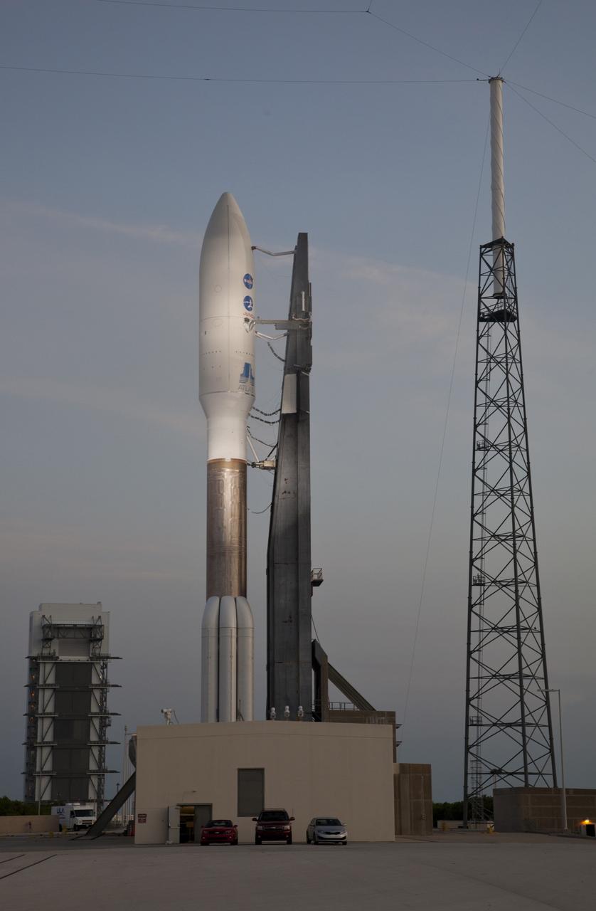 CAPE CANAVERAL, Fla. -- As night falls at Cape Canaveral Air Force Station in Florida, the lights on Space Launch Complex 41 reveal preparations to launch the United Launch Alliance Atlas V-551 launch vehicle carrying NASA's Juno spacecraft are proceeding on schedule.    Liftoff is planned during a launch window which extends from 11:34 a.m. to 12:43 p.m. EDT on Aug. 5. The solar-powered spacecraft will orbit Jupiter's poles 33 times to find out more about the gas giant's origins, structure, atmosphere and magnetosphere and investigate the existence of a solid planetary core. NASA's Jet Propulsion Laboratory, Pasadena, Calif., manages the Juno mission for the principal investigator, Scott Bolton, of Southwest Research Institute in San Antonio. The Juno mission is part of the New Frontiers Program managed at NASA's Marshall Space Flight Center in Huntsville, Ala. Lockheed Martin Space Systems, Denver, built the spacecraft. Launch management for the mission is the responsibility of NASA's Launch Services Program at the Kennedy Space Center in Florida.  For more information, visit www.nasa.gov/juno. Photo credit: Courtesy of Scott Andrews