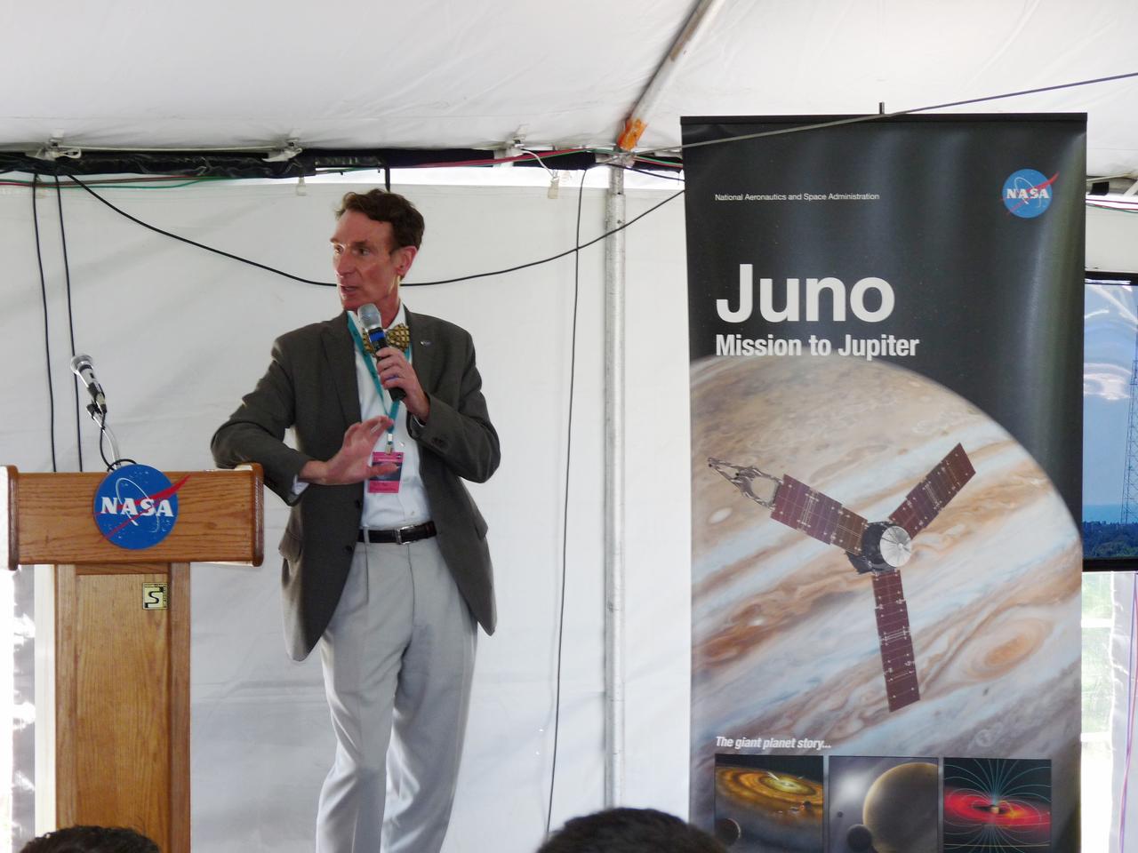 CAPE CANAVERAL, Fla. – At NASA’s Kennedy Space Center in Florida, television personality Bill Nye, the science guy, speaks to about 150 followers of the agency’s Twitter account during Juno Tweetup activities inside a tent at the Press Site. The tweeters are at the center for two days of prelaunch activities. Juno is NASA’s mission to Jupiter to study the giant planet and improve our understanding of the planet’s formation and evolution. The tweeters will share their experiences with followers through the social networking site Twitter.    Attendees represent 28 states, the District of Columbia and five other countries: Canada, Finland, Norway, Spain and the United Kingdom. This is the first time NASA has invited Twitter followers to experience the launch of a planetary spacecraft.  The Juno spacecraft is scheduled to launch on an Atlas V rocket from Space Launch Complex 41 at Cape Canaveral Air Force Station in Florida, Aug. 5, at 11:34 a.m. EDT.  For more information, visit http://www.nasa.gov/juno.  Photo credit: NASA/Fletcher Hildreth