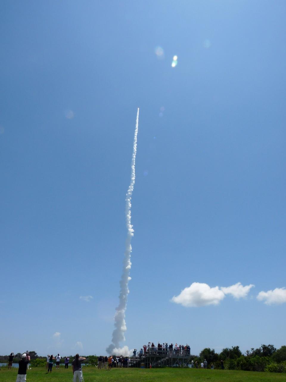 CAPE CANAVERAL, Fla. -- At the Press Site at NASA’s Kennedy Space Center in Florida, about 150 followers of the agency’s Twitter account view the launch of NASA's Juno planetary probe atop a United Launch Alliance Atlas V-551 rocket. The tweeters, in turn, will share their experiences with followers through the social networking site Twitter.    Liftoff was at 12:25 p.m. EDT Aug. 5 from Space Launch Complex 41 on Cape Canaveral Air Force Station in Florida. The solar-powered spacecraft will orbit Jupiter's poles 33 times to find out more about the gas giant's origins, structure, atmosphere and magnetosphere and investigate the existence of a solid planetary core. NASA's Jet Propulsion Laboratory, Pasadena, Calif., manages the Juno mission for the principal investigator, Scott Bolton, of Southwest Research Institute in San Antonio. The Juno mission is part of the New Frontiers Program managed at NASA's Marshall Space Flight Center in Huntsville, Ala. Lockheed Martin Space Systems, Denver, built the spacecraft. Launch management for the mission is the responsibility of NASA's Launch Services Program at the Kennedy Space Center in Florida.  For more information, visit www.nasa.gov/juno. Photo credit: NASA/Fletcher Hildreth