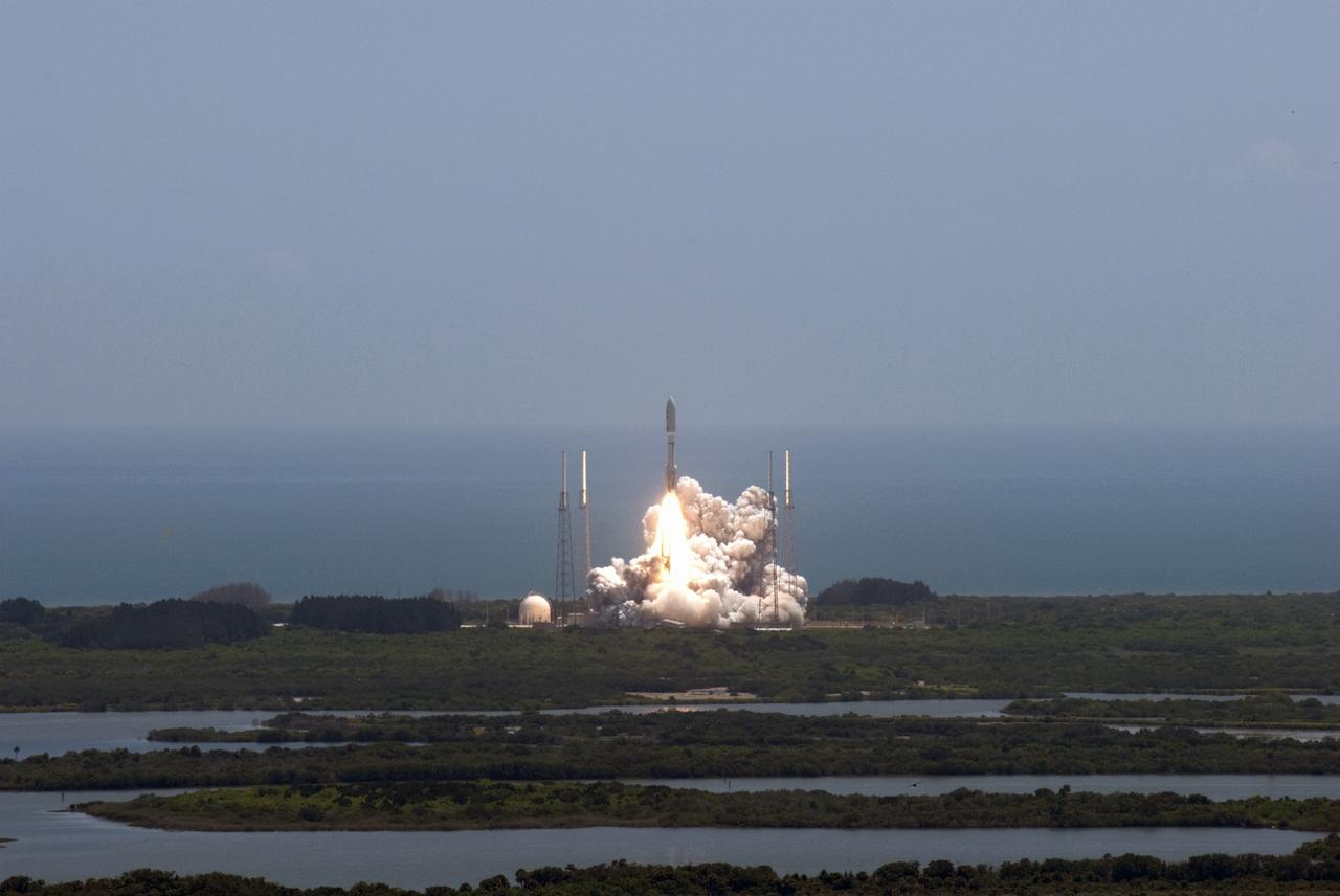 CAPE CANAVERAL, Fla. -- NASA's Juno planetary probe, enclosed in its payload fairing, begins its five-year journey to Jupiter atop a United Launch Alliance Atlas V-551 launch vehicle from Space Launch Complex 41 on Cape Canaveral Air Force Station in Florida.    Liftoff was at 12:25 p.m. EDT Aug. 5. The solar-powered spacecraft will orbit Jupiter's poles 33 times to find out more about the gas giant's origins, structure, atmosphere and magnetosphere and investigate the existence of a solid planetary core. NASA's Jet Propulsion Laboratory, Pasadena, Calif., manages the Juno mission for the principal investigator, Scott Bolton, of Southwest Research Institute in San Antonio. The Juno mission is part of the New Frontiers Program managed at NASA's Marshall Space Flight Center in Huntsville, Ala. Lockheed Martin Space Systems, Denver, built the spacecraft. Launch management for the mission is the responsibility of NASA's Launch Services Program at the Kennedy Space Center in Florida.  For more information, visit www.nasa.gov/juno. Photo credit: NASA/Jim Grossmann