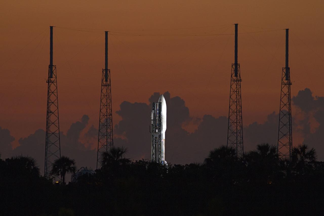 CAPE CANAVERAL, Fla. -- As the sun comes up over Cape Canaveral Air Force Station in Florida, preparations are under way at Space Launch Complex 41 to launch the United Launch Alliance Atlas V-551 launch vehicle carrying NASA's Juno spacecraft.      Liftoff is planned during a launch window which extends from 11:34 a.m. to 12:43 p.m. EDT on Aug. 5. The solar-powered spacecraft will orbit Jupiter's poles 33 times to find out more about the gas giant's origins, structure, atmosphere and magnetosphere and investigate the existence of a solid planetary core. NASA's Jet Propulsion Laboratory, Pasadena, Calif., manages the Juno mission for the principal investigator, Scott Bolton, of Southwest Research Institute in San Antonio. The Juno mission is part of the New Frontiers Program managed at NASA's Marshall Space Flight Center in Huntsville, Ala. Lockheed Martin Space Systems, Denver, built the spacecraft. Launch management for the mission is the responsibility of NASA's Launch Services Program at the Kennedy Space Center in Florida.  For more information, visit www.nasa.gov/juno. Photo credit: NASA/Kenny Allen