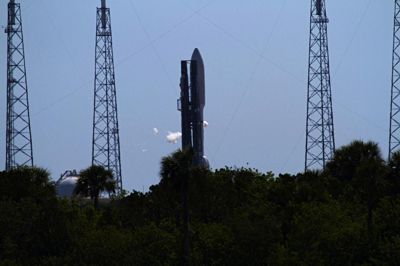CAPE CANAVERAL, Fla. -- NASA's Juno planetary probe, enclosed in its payload fairing, is moments away from beginning its five-year journey to Jupiter atop a United Launch Alliance Atlas V-551 launch vehicle from Space Launch Complex 41 on Cape Canaveral Air Force Station in Florida.    Liftoff was at 12:25 p.m. EDT Aug. 5. The solar-powered spacecraft will orbit Jupiter's poles 33 times to find out more about the gas giant's origins, structure, atmosphere and magnetosphere and investigate the existence of a solid planetary core. NASA's Jet Propulsion Laboratory, Pasadena, Calif., manages the Juno mission for the principal investigator, Scott Bolton, of Southwest Research Institute in San Antonio. The Juno mission is part of the New Frontiers Program managed at NASA's Marshall Space Flight Center in Huntsville, Ala. Lockheed Martin Space Systems, Denver, built the spacecraft. Launch management for the mission is the responsibility of NASA's Launch Services Program at the Kennedy Space Center in Florida.  For more information, visit www.nasa.gov/juno. Photo credit: NASA/Kenny Allen