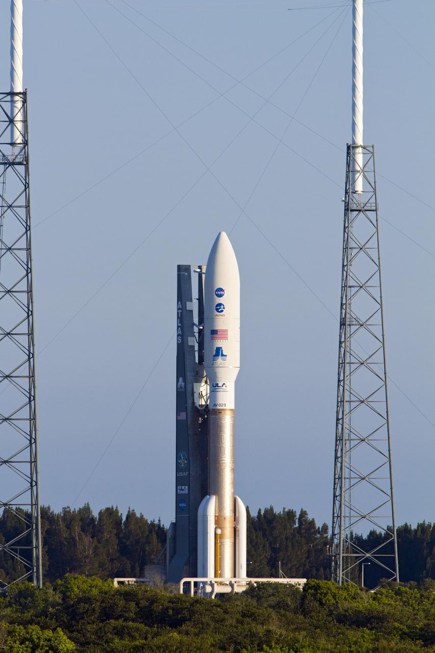 CAPE CANAVERAL, Fla. -- NASA's Juno planetary probe is poised for its five-year journey to Jupiter atop a United Launch Alliance Atlas V-551 launch vehicle on Space Launch Complex 41 on Cape Canaveral Air Force Station in Florida.     Liftoff was at 12:25 p.m. EDT Aug. 5. The solar-powered spacecraft will orbit Jupiter's poles 33 times to find out more about the gas giant's origins, structure, atmosphere and magnetosphere and investigate the existence of a solid planetary core. NASA's Jet Propulsion Laboratory, Pasadena, Calif., manages the Juno mission for the principal investigator, Scott Bolton, of Southwest Research Institute in San Antonio. The Juno mission is part of the New Frontiers Program managed at NASA's Marshall Space Flight Center in Huntsville, Ala. Lockheed Martin Space Systems, Denver, built the spacecraft. Launch management for the mission is the responsibility of NASA's Launch Services Program at the Kennedy Space Center in Florida.  For more information, visit www.nasa.gov/juno. Photo credit: NASA/George Roberts and Rusty Backer