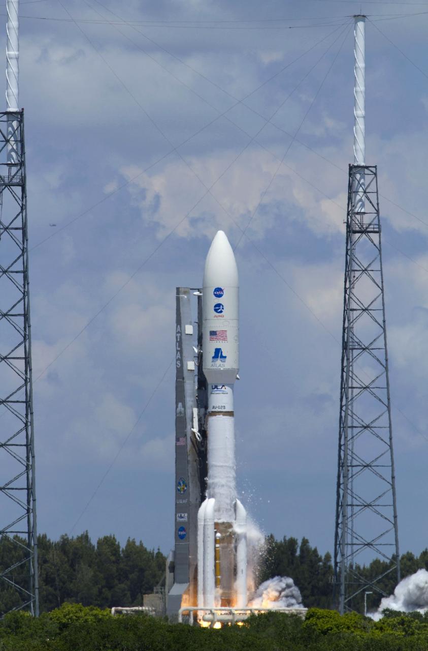 CAPE CANAVERAL, Fla. -- Frost breaks away from the first stage of the United Launch Alliance Atlas V-551 launch vehicle carrying NASA's Juno planetary probe as its motors ignite on the pad at Space Launch Complex 41 on Cape Canaveral Air Force Station in Florida.  The frost forms when the stage is filled with its supercold liquid oxygen fuel.     Liftoff was at 12:25 p.m. EDT Aug. 5. The solar-powered spacecraft will orbit Jupiter's poles 33 times to find out more about the gas giant's origins, structure, atmosphere and magnetosphere and investigate the existence of a solid planetary core. NASA's Jet Propulsion Laboratory, Pasadena, Calif., manages the Juno mission for the principal investigator, Scott Bolton, of Southwest Research Institute in San Antonio. The Juno mission is part of the New Frontiers Program managed at NASA's Marshall Space Flight Center in Huntsville, Ala. Lockheed Martin Space Systems, Denver, built the spacecraft. Launch management for the mission is the responsibility of NASA's Launch Services Program at the Kennedy Space Center in Florida.  For more information, visit www.nasa.gov/juno. Photo credit: NASA/George Roberts and Rusty Backer