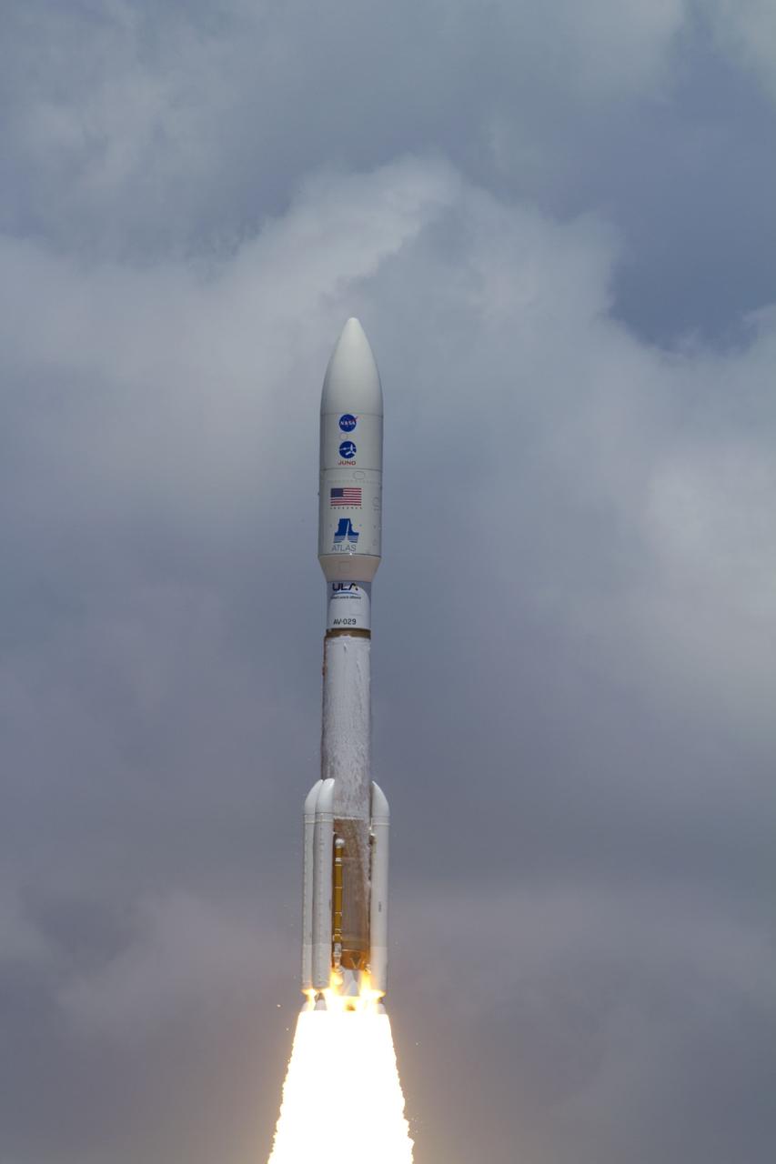 CAPE CANAVERAL, Fla. -- The United Launch Alliance Atlas V-551 launch vehicle carrying NASA's Juno planetary probe is off to a roaring start on its five-year journey from Space Launch Complex 41 on Cape Canaveral Air Force Station in Florida.    Liftoff was at 12:25 p.m. EDT Aug. 5. The solar-powered spacecraft will orbit Jupiter's poles 33 times to find out more about the gas giant's origins, structure, atmosphere and magnetosphere and investigate the existence of a solid planetary core. NASA's Jet Propulsion Laboratory, Pasadena, Calif., manages the Juno mission for the principal investigator, Scott Bolton, of Southwest Research Institute in San Antonio. The Juno mission is part of the New Frontiers Program managed at NASA's Marshall Space Flight Center in Huntsville, Ala. Lockheed Martin Space Systems, Denver, built the spacecraft. Launch management for the mission is the responsibility of NASA's Launch Services Program at the Kennedy Space Center in Florida.  For more information, visit www.nasa.gov/juno. Photo credit: NASA/George Roberts and Rusty Backer