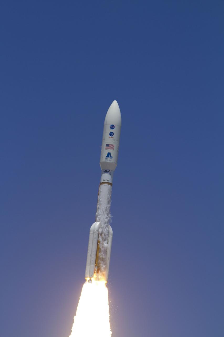 CAPE CANAVERAL, Fla. -- Frost breaks away from the first stage of the United Launch Alliance Atlas V-551 launch vehicle carrying NASA's Juno planetary probe as it begins its five-year journey to Jupiter from Space Launch Complex 41 on Cape Canaveral Air Force Station in Florida.  The frost forms when the stage is filled with its supercold liquid oxygen fuel.    Liftoff was at 12:25 p.m. EDT Aug. 5. The solar-powered spacecraft will orbit Jupiter's poles 33 times to find out more about the gas giant's origins, structure, atmosphere and magnetosphere and investigate the existence of a solid planetary core. NASA's Jet Propulsion Laboratory, Pasadena, Calif., manages the Juno mission for the principal investigator, Scott Bolton, of Southwest Research Institute in San Antonio. The Juno mission is part of the New Frontiers Program managed at NASA's Marshall Space Flight Center in Huntsville, Ala. Lockheed Martin Space Systems, Denver, built the spacecraft. Launch management for the mission is the responsibility of NASA's Launch Services Program at the Kennedy Space Center in Florida.  For more information, visit www.nasa.gov/juno. Photo credit: NASA/George Roberts and Rusty Backer