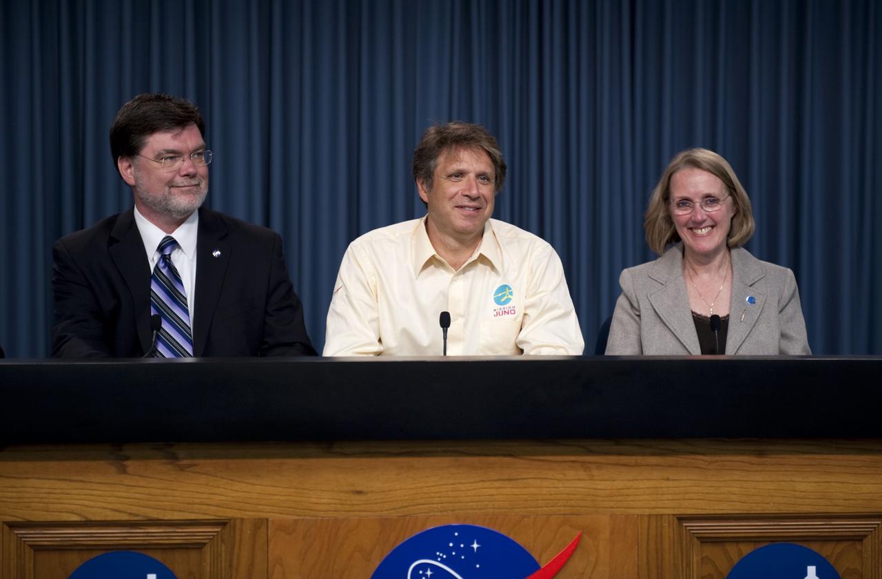 CAPE CANAVERAL, Fla. -- From left, Jim Adams, the deputy director of NASA's Planetary Science Division; Scott Bolton, Juno's principal investigator at the Southwest Research Institute (SWRI); and Jan Chodas, Juno's project manager at the Jet Propulsion Laboratory (JPL), participate in a post-launch news conference following the successful liftoff of the Juno spacecraft atop a United Launch Alliance Atlas V rocket. Launch was at 12:25 p.m. EDT Aug. 5. The solar-powered spacecraft now is on a five-year journey to Jupiter, where it will orbit the planet's poles 33 times to find out more about the gas giant's origins, structure, atmosphere and magnetosphere and investigate the existence of a solid planetary core. For more information, visit www.nasa.gov/juno. Photo credit: Kim Shiflett