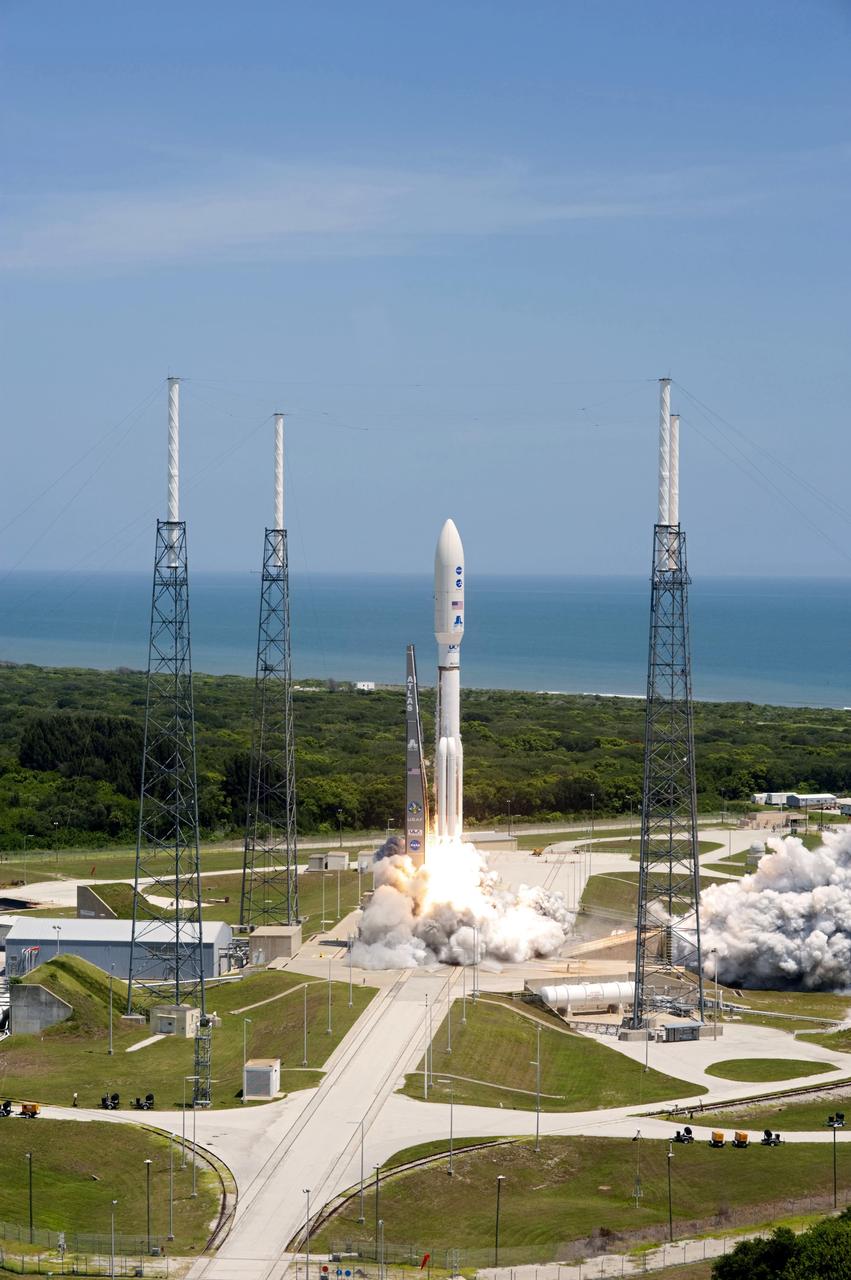 CAPE CANAVERAL, Fla. -- Rising from fire and smoke, NASA's Juno planetary probe, enclosed in its payload fairing, launches atop a United Launch Alliance Atlas V rocket. Leaving from Space Launch Complex 41 on Cape Canaveral Air Force Station in Florida, the spacecraft will embark on a five-year journey to Jupiter.        Liftoff was at 12:25 p.m. EDT Aug. 5. The solar-powered spacecraft will orbit Jupiter's poles 33 times to find out more about the gas giant's origins, structure, atmosphere and magnetosphere and investigate the existence of a solid planetary core. For more information, visit www.nasa.gov/juno. Photo credit: NASA/Tony Gray and Tim Powers