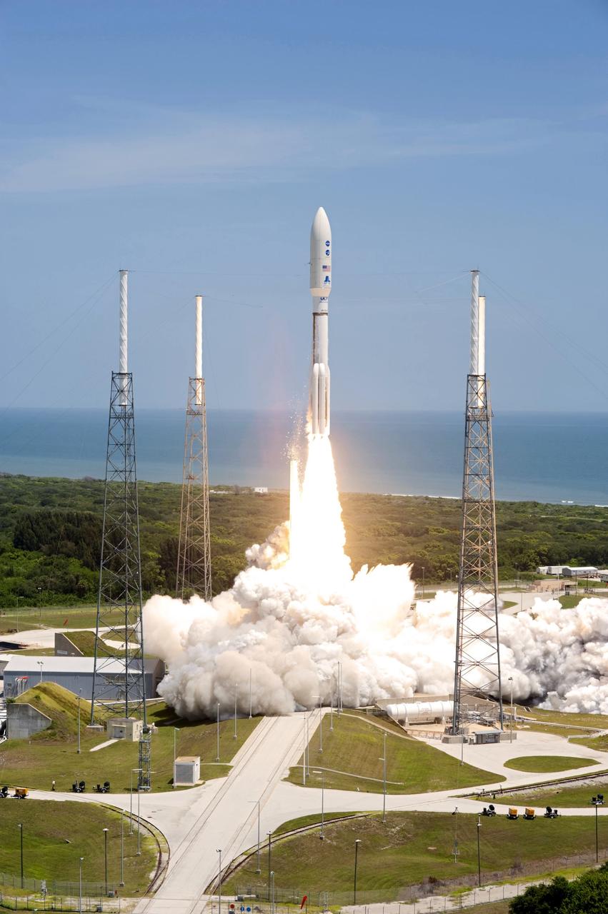 CAPE CANAVERAL, Fla. -- Rising from fire and smoke, NASA's Juno planetary probe, enclosed in its payload fairing, launches atop a United Launch Alliance Atlas V rocket. Leaving from Space Launch Complex 41 on Cape Canaveral Air Force Station in Florida, the spacecraft will embark on a five-year journey to Jupiter.      Liftoff was at 12:25 p.m. EDT Aug. 5. The solar-powered spacecraft will orbit Jupiter's poles 33 times to find out more about the gas giant's origins, structure, atmosphere and magnetosphere and investigate the existence of a solid planetary core. For more information, visit www.nasa.gov/juno. Photo credit: NASA/Tony Gray and Tim Powers