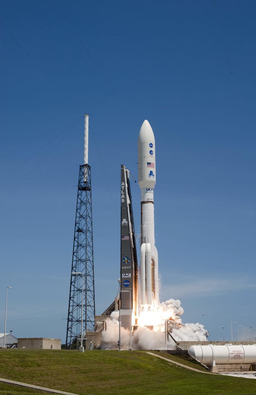 CAPE CANAVERAL, Fla. -- Rising from fire and smoke, NASA's Juno planetary probe, enclosed in its payload fairing, launches atop a United Launch Alliance Atlas V rocket. Leaving from Space Launch Complex 41 on Cape Canaveral Air Force Station in Florida, the spacecraft will embark on a five-year journey to Jupiter.          Liftoff was at 12:25 p.m. EDT Aug. 5. The solar-powered spacecraft will orbit Jupiter's poles 33 times to find out more about the gas giant's origins, structure, atmosphere and magnetosphere and investigate the existence of a solid planetary core. For more information, visit www.nasa.gov/juno. Photo credit: NASA/Tony Gray and Don Kight