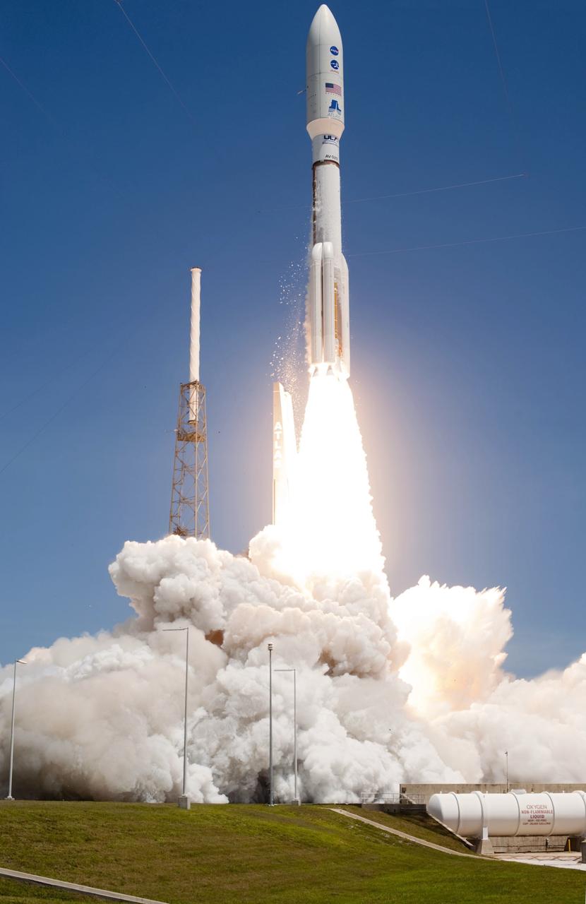 CAPE CANAVERAL, Fla. -- Rising from fire and smoke, NASA's Juno planetary probe, enclosed in its payload fairing, launches atop a United Launch Alliance Atlas V rocket. Leaving from Space Launch Complex 41 on Cape Canaveral Air Force Station in Florida, the spacecraft will embark on a five-year journey to Jupiter.      Liftoff was at 12:25 p.m. EDT Aug. 5. The solar-powered spacecraft will orbit Jupiter's poles 33 times to find out more about the gas giant's origins, structure, atmosphere and magnetosphere and investigate the existence of a solid planetary core. For more information, visit www.nasa.gov/juno. Photo credit: NASA/Tony Gray and Don Kight