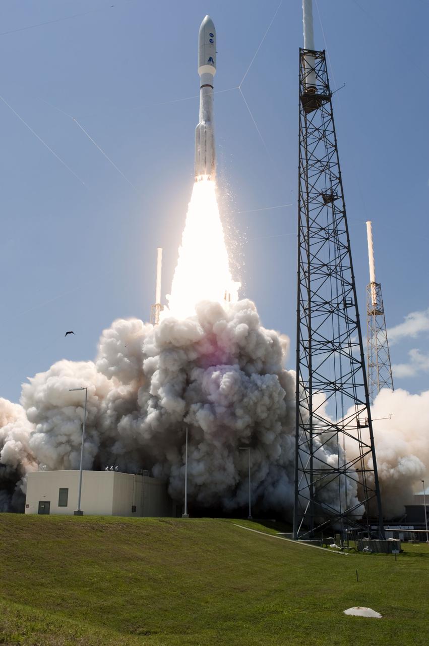 CAPE CANAVERAL, Fla. -- Rising from fire and smoke, NASA's Juno planetary probe, enclosed in its payload fairing, launches atop a United Launch Alliance Atlas V rocket. Leaving from Space Launch Complex 41 on Cape Canaveral Air Force Station in Florida, the spacecraft will embark on a five-year journey to Jupiter.        Liftoff was at 12:25 p.m. EDT Aug. 5. The solar-powered spacecraft will orbit Jupiter's poles 33 times to find out more about the gas giant's origins, structure, atmosphere and magnetosphere and investigate the existence of a solid planetary core. For more information, visit www.nasa.gov/juno. Photo credit: NASA/Tony Gray and Tim Powers