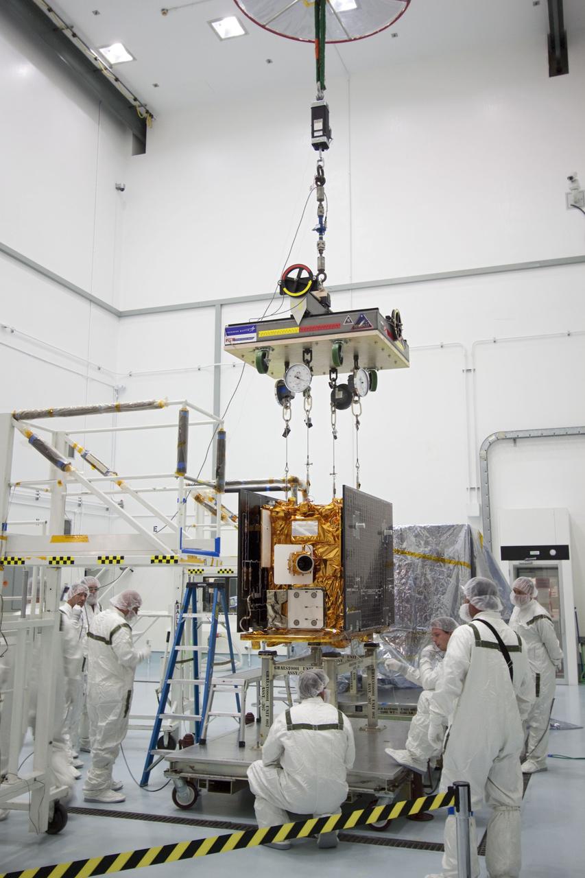 CAPE CANAVERAL, Fla. -- At Astrotech Space Operation's payload processing facility in Titusville, Fla., a portable scale lifts one of NASA's twin Gravity Recovery and Interior Laboratory lunar spacecraft from its workstand. The scale will record the exact weight of the spacecraft before they are stacked in their launch configuration in preparation for transport to the launch pad. GRAIL will fly in tandem orbits around the moon for several months to measure its gravity field. GRAIL's primary science objectives are to determine the structure of the lunar interior, from crust to core, and to advance understanding of the thermal evolution of the moon. Launch aboard a United Launch Alliance Delta II rocket from Space Launch Complex 17B on Cape Canaveral Air Force Station is scheduled for Sept. 8. For more information, visit http://www.nasa.gov/grail. Photo credit: NASA/Jim Grossmann
