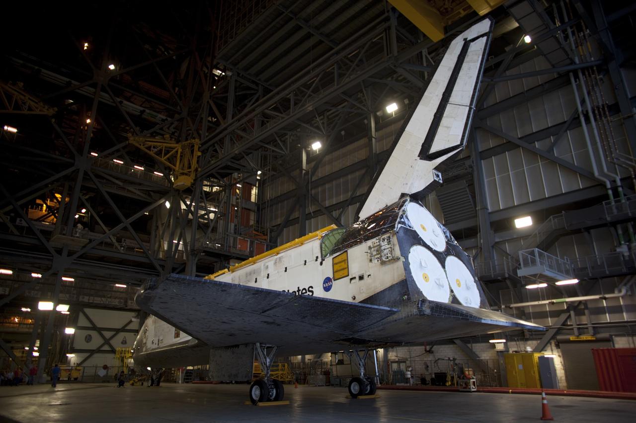 CAPE CANAVERAL, Fla. -- At NASA's Kennedy Space Center in Florida, preparations are under way to move space shuttle Discovery from the Vehicle Assembly Building (VAB) to Orbiter Processing Facility-1 (OPF-1).  Discovery is switching places with shuttle Endeavour which has been undergoing decommissioning activities in OPF-1.  Both shuttles will stop briefly outside OPF-3 for a "nose-to-nose" photo opportunity. Discovery then will be rolled into OPF-1 and Endeavour into the VAB.    In OPF-1, Discovery will undergo further preparations for public display at the Smithsonian's National Air and Space Museum Steven F. Udvar-Hazy Center in Virginia. Endeavour will be stored in the VAB until October when it will be moved into OPF-2 for further work to get it ready for public display at the California Science Center in Los Angeles.  For more information, visit http://www.nasa.gov/shuttle. Photo credit: NASA/Dimitri Gerondidakis