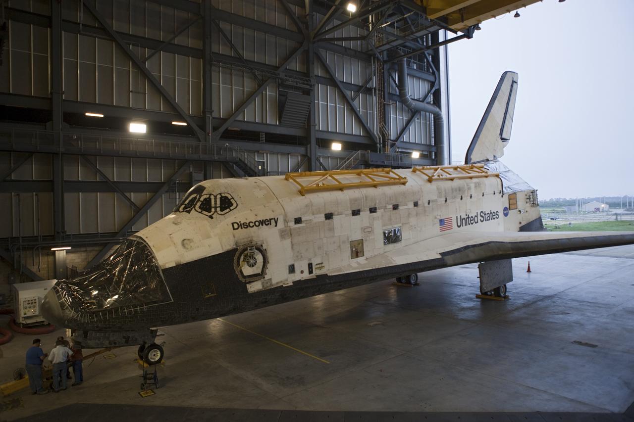 CAPE CANAVERAL, Fla. -- At NASA's Kennedy Space Center in Florida, preparations have begun to move space shuttle Discovery from the Vehicle Assembly Building (VAB) to Orbiter Processing Facility-1 (OPF-1).  Discovery is switching places with shuttle Endeavour which has been undergoing decommissioning activities in OPF-1.  Both shuttles will stop briefly outside OPF-3 for a "nose-to-nose" photo opportunity. Discovery then will be rolled into OPF-1 and Endeavour into the VAB.    In OPF-1, Discovery will undergo further preparations for public display at the Smithsonian's National Air and Space Museum Steven F. Udvar-Hazy Center in Virginia. Endeavour will be stored in the VAB until October when it will be moved into OPF-2 for further work to get it ready for public display at the California Science Center in Los Angeles.  For more information, visit http://www.nasa.gov/shuttle. Photo credit: NASA/Dimitri Gerondidakis