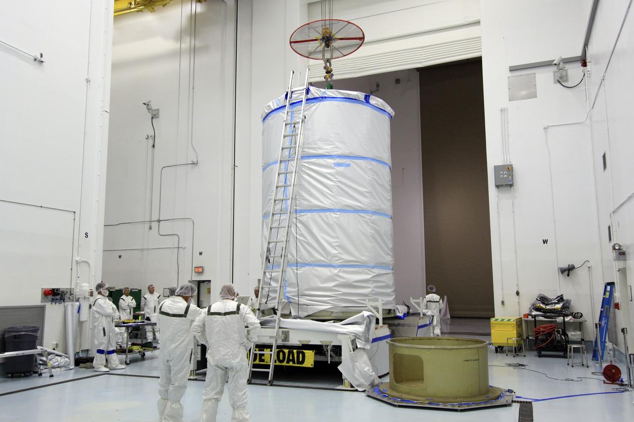 CAPE CANAVERAL, Fla. -- At Astrotech Space Operation's payload processing facility in Titusville, Fla., the protective canister enclosing NASA's twin Gravity Recovery and Interior Laboratory spacecraft is secured on a transportation pallet.  Preparations are under way to move the lunar probes, attached to a spacecraft adapter ring in their side-by-side launch configuration, to the launch pad.    The spacecraft will fly in tandem orbits around the moon for several months to measure its gravity field. GRAIL's primary science objectives are to determine the structure of the lunar interior, from crust to core, and to advance understanding of the thermal evolution of the moon.  Launch aboard a United Launch Alliance Delta II rocket from Space Launch Complex 17B on Cape Canaveral Air Force Station is scheduled for Sept. 8.  For more information, visit http://www.nasa.gov/grail. Photo credit: NASA/Jim Grossmann