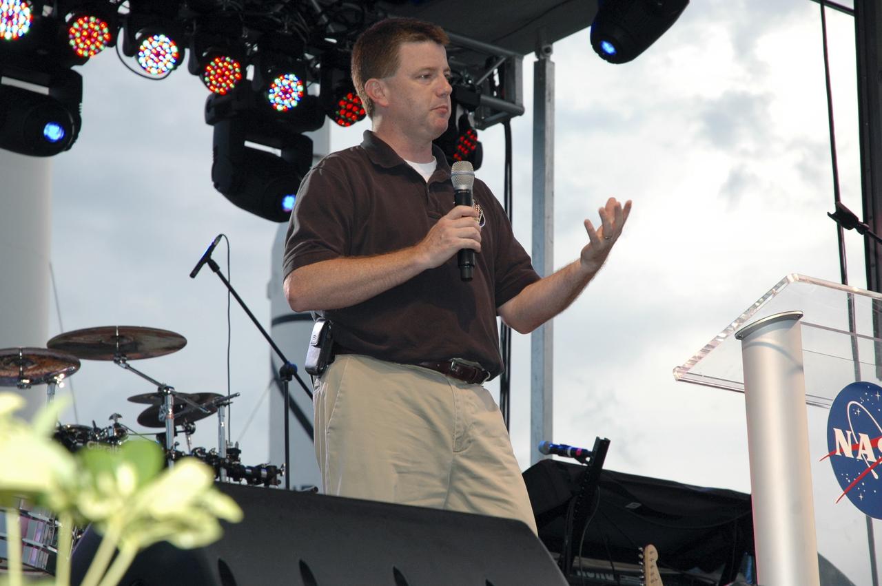 CAPE CANAVERAL, Fla. -- NASA’s Space Shuttle Program Launch Integration Manager Mike Moses speaks to current and former space shuttle workers and their families during the “We Made History! Shuttle Program Celebration,” Aug. 13, at the Kennedy Space Center Visitor Complex, Fla. The event was held to honor shuttle workers’ dedication to the agency’s Space Shuttle Program and to celebrate 30 years of space shuttle achievements. The event featured food, music, entertainment, astronaut appearances, educational activities, giveaways, and Starfire Night Skyshow. Photo credit: Gianni Woods