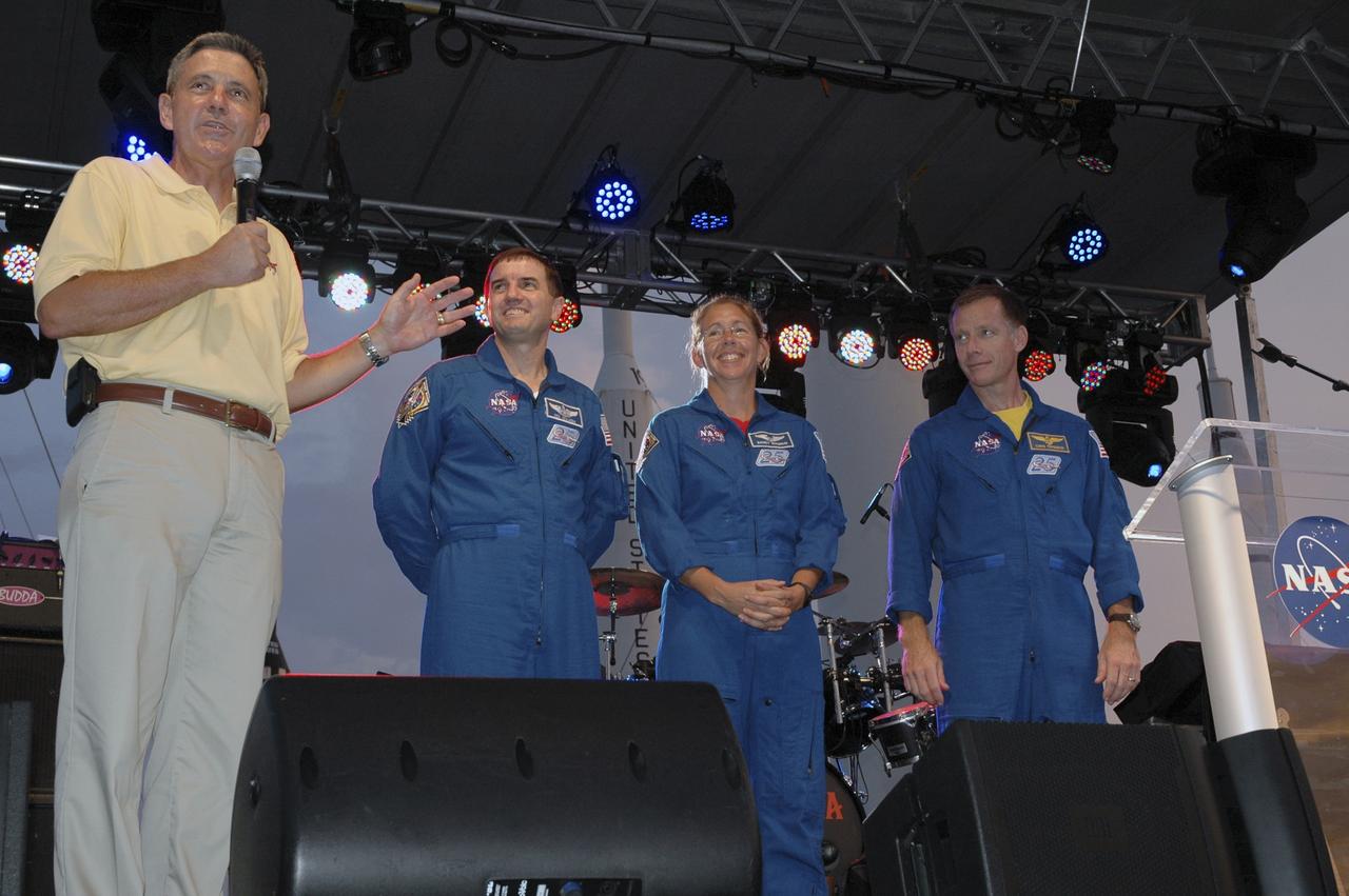 CAPE CANAVERAL, Fla. -- Kennedy Space Center Director Bob Cabana (at left) and NASA astronauts Rex Walheim, Sandra Magnus and Chris Ferguson talk to current and former space shuttle workers and their families during the “We Made History! Shuttle Program Celebration,” Aug. 13, at the Kennedy Space Center Visitor Complex, Fla. The event was held to honor current and former shuttle workers’ dedication to NASA’s Space Shuttle Program and to celebrate 30 years of space shuttle achievements. The event featured food, music, entertainment, astronaut appearances, educational activities, giveaways, and Starfire Night Skyshow. Photo credit: Gianni Woods