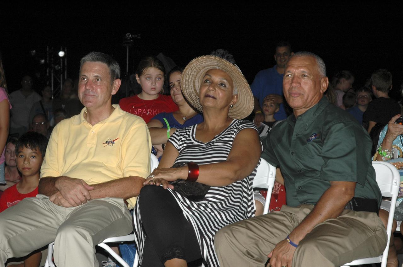 CAPE CANAVERAL, Fla. -- Kennedy Space Center Director Bob Cabana (at left), Jackie Bolden and her husband, NASA Administrator Charlie Bolden, enjoy the entertainment at the main stage during the “We Made History! Shuttle Program Celebration,” Aug. 13, at the Kennedy Space Center Visitor Complex, Fla. The event was held to honor current and former shuttle workers’ dedication to NASA’s Space Shuttle Program and to celebrate 30 years of space shuttle achievements. The event featured food, music, entertainment, astronaut appearances, educational activities, giveaways, and Starfire Night Skyshow. Photo credit: Gianni Woods