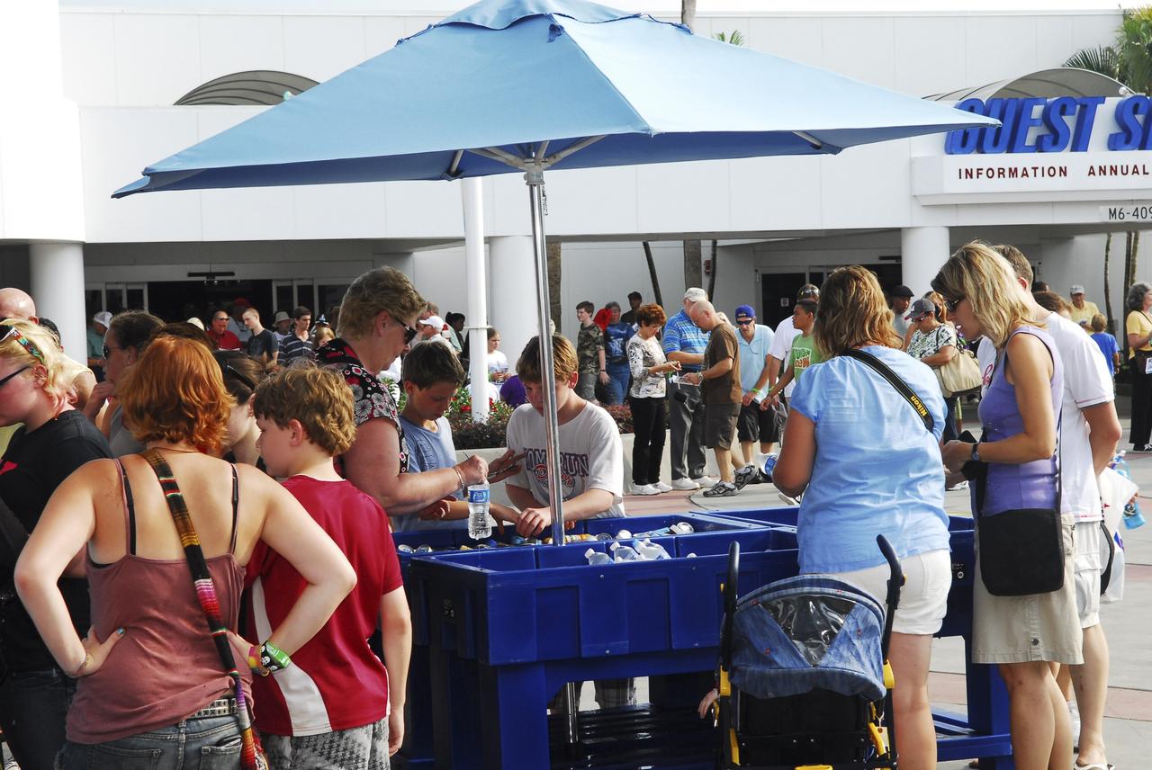 CAPE CANAVERAL, Fla. -- Thousands of space shuttle workers and their families gather near Guest Services at the Kennedy Space Center Visitor Complex in Florida for the “We Made History! Shuttle Program Celebration” on Aug. 13. The event was held to honor current and former workers’ dedication to NASA’s Space Shuttle Program and to celebrate 30 years of space shuttle achievements. The event featured food, music, entertainment, astronaut appearances, educational activities, giveaways, and Starfire Night Skyshow. Photo credit: Jim Grossmann