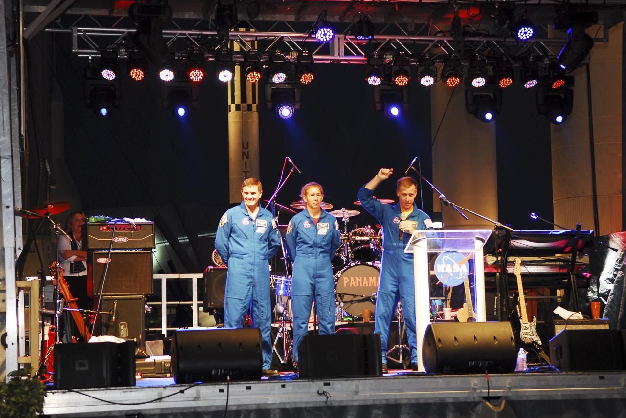 CAPE CANAVERAL, Fla. -- STS-135 Mission Specialists Rex Walheim, left, and Sandy Magnus, and STS-135 Commander Chris Ferguson address thousands of space shuttle workers and their families at the “We Made History! Shuttle Program Celebration,” Aug. 13, at the Kennedy Space Center Visitor Complex, Fla. The event was held to honor current and former workers’ dedication to NASA’s Space Shuttle Program and to celebrate 30 years of space shuttle achievements. The event featured food, music, entertainment, astronaut appearances, educational activities, giveaways, and Starfire Night Skyshow. Photo credit: Jim Grossmann