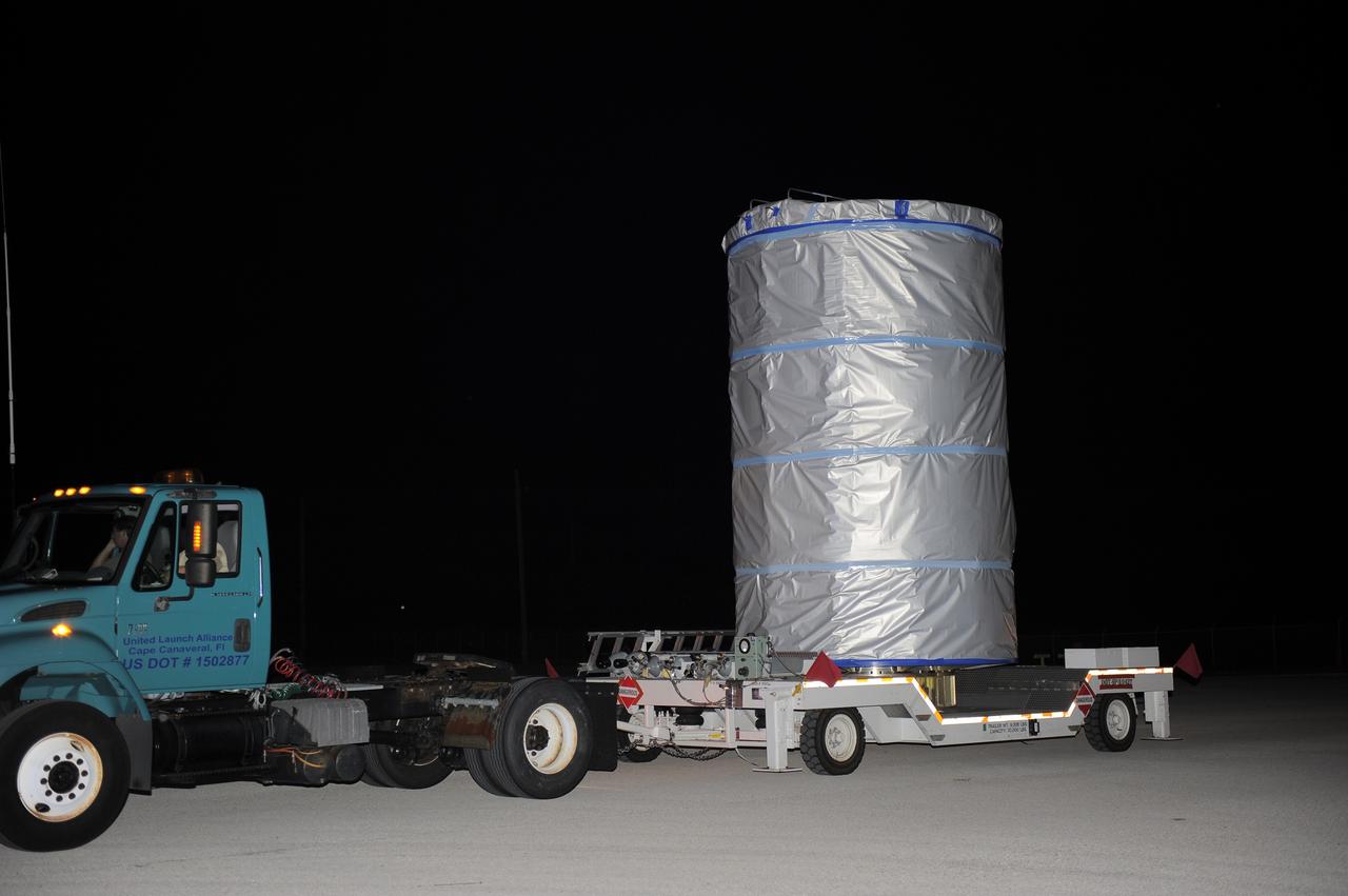 CAPE CANAVERAL, Fla. -- NASA's twin Gravity Recovery and Interior Laboratory (GRAIL) spacecraft are transported from the Astrotech Space Operation's payload processing facility in Titusville, Fla., to their launch pad at Space Launch Complex 17B at Cape Canaveral Air Force Station in Florida. The lunar probes are attached to a spacecraft adapter ring in their side-by-side launch configuration and wrapped in plastic to prevent contamination outside the clean room.    The spacecraft will fly in tandem orbits around the moon for several months to measure its gravity field. GRAIL's primary science objectives are to determine the structure of the lunar interior, from crust to core, and to advance understanding of the thermal evolution of the moon.  Launch aboard a United Launch Alliance Delta II rocket is scheduled for Sept. 8. For more information, visit www.nasa.gov/grail. Photo credit: NASA/Kim Shiflett